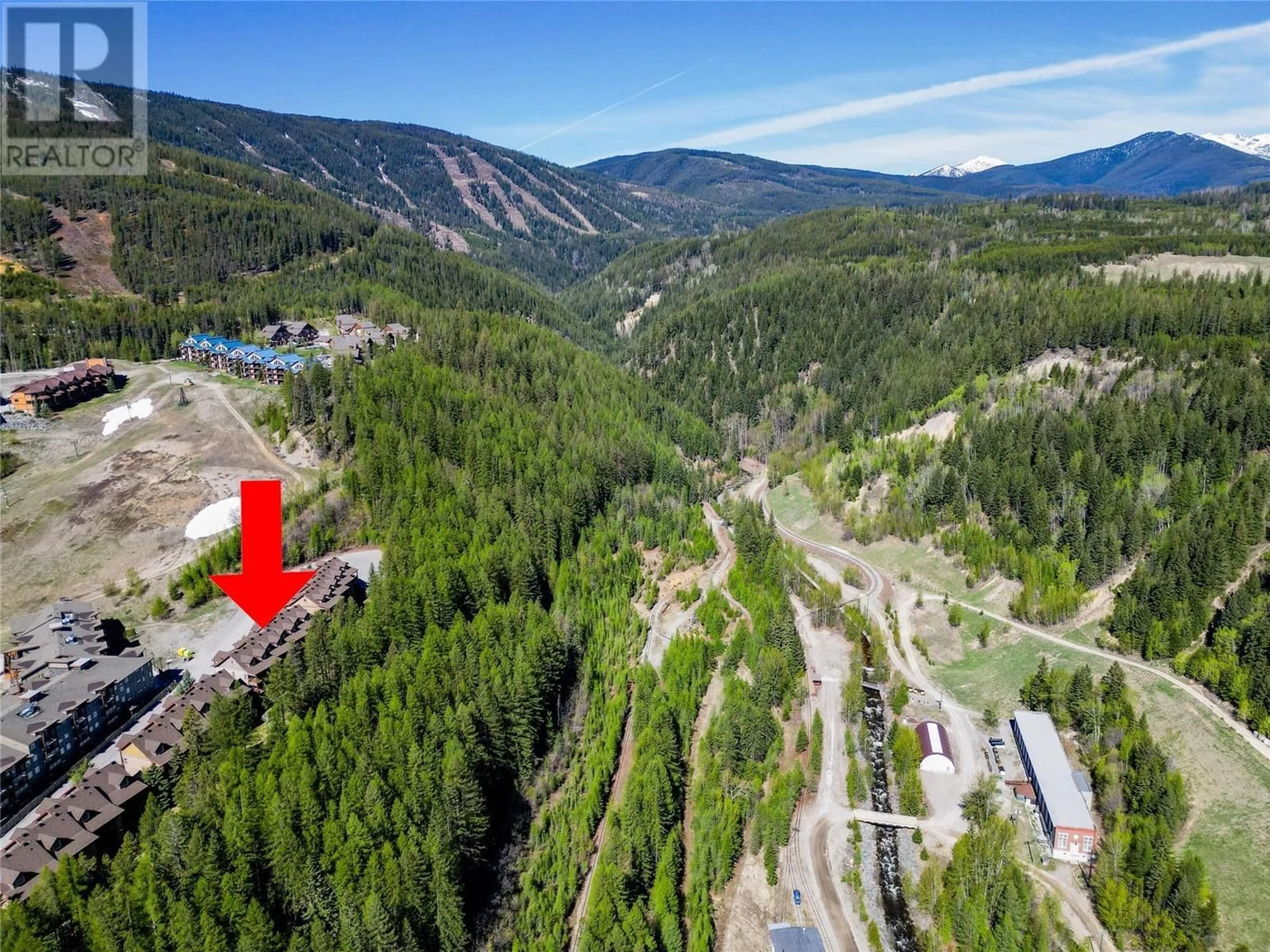 A pic from outside/outdoor area/front of a property/back of a property/a pic from drone, forest/trees view for 310 - 300 STEMWINDER DRIVE, Kimberley British Columbia V1A3E9
