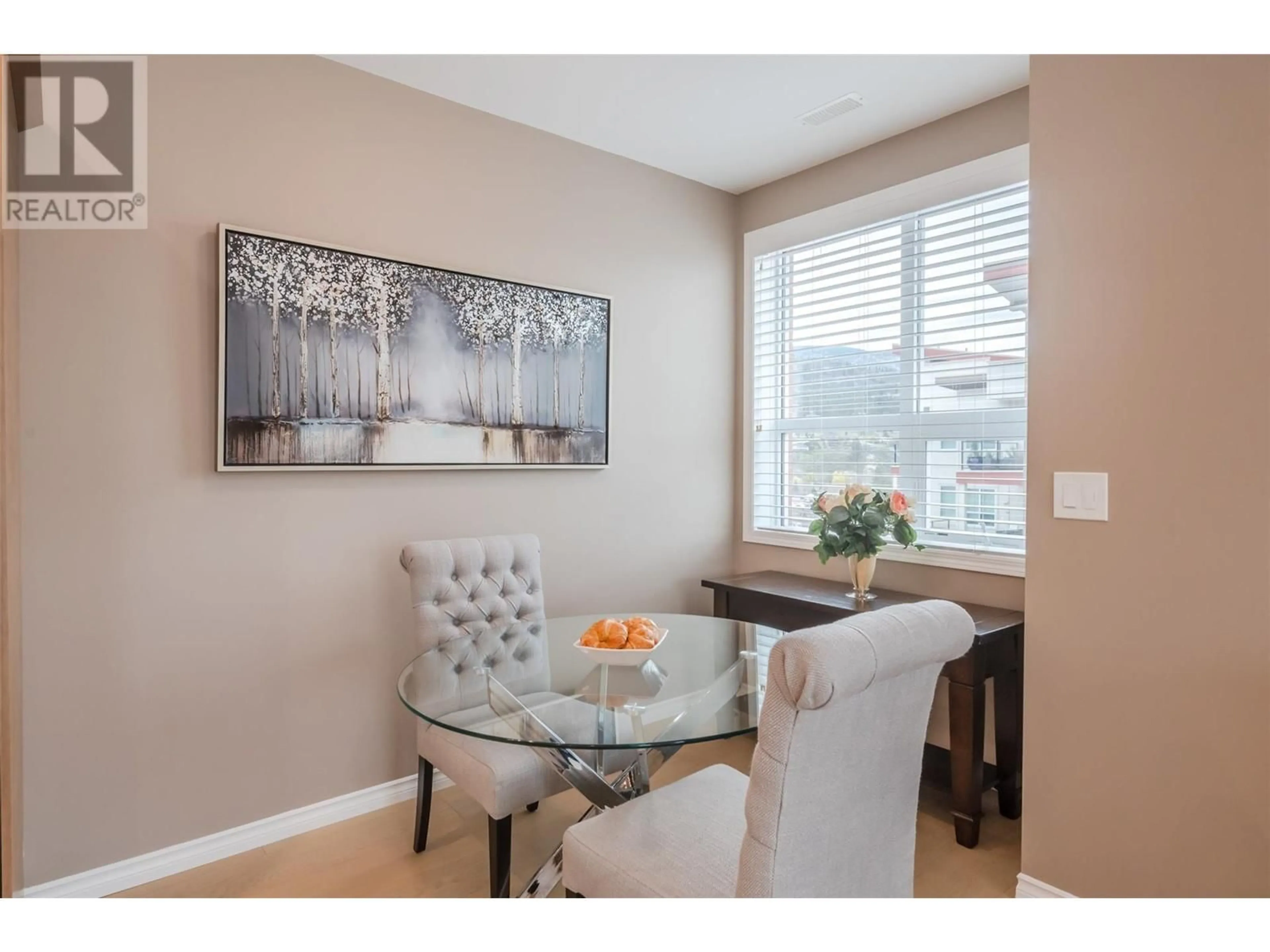 Dining room, wood/laminate floor for 1204 - 3346 SKAHA LAKE ROAD, Penticton British Columbia V2A0H6