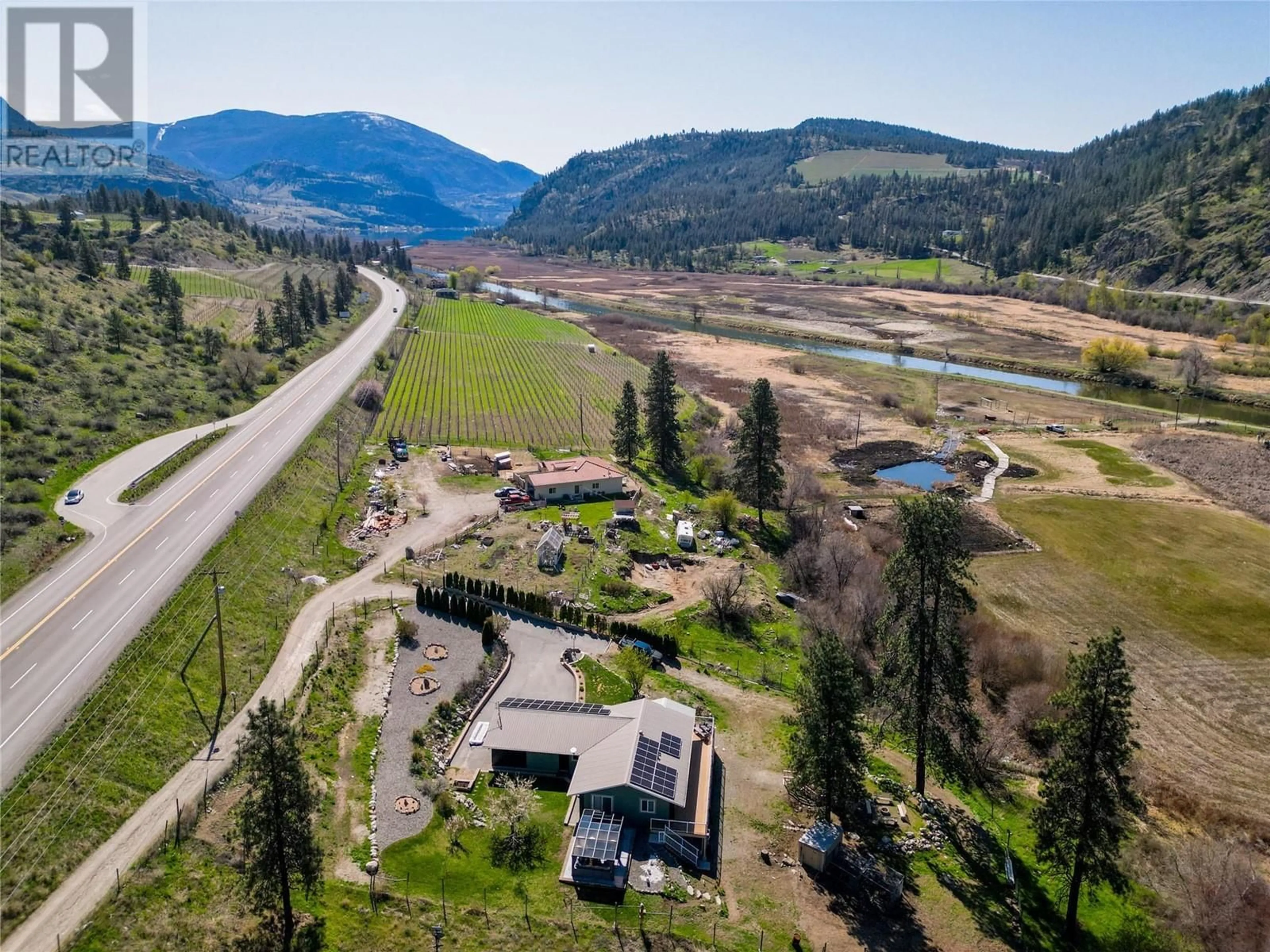 A pic from outside/outdoor area/front of a property/back of a property/a pic from drone, mountain view for 1998 HWY 97 HIGHWAY, Okanagan Falls British Columbia V0H1R0
