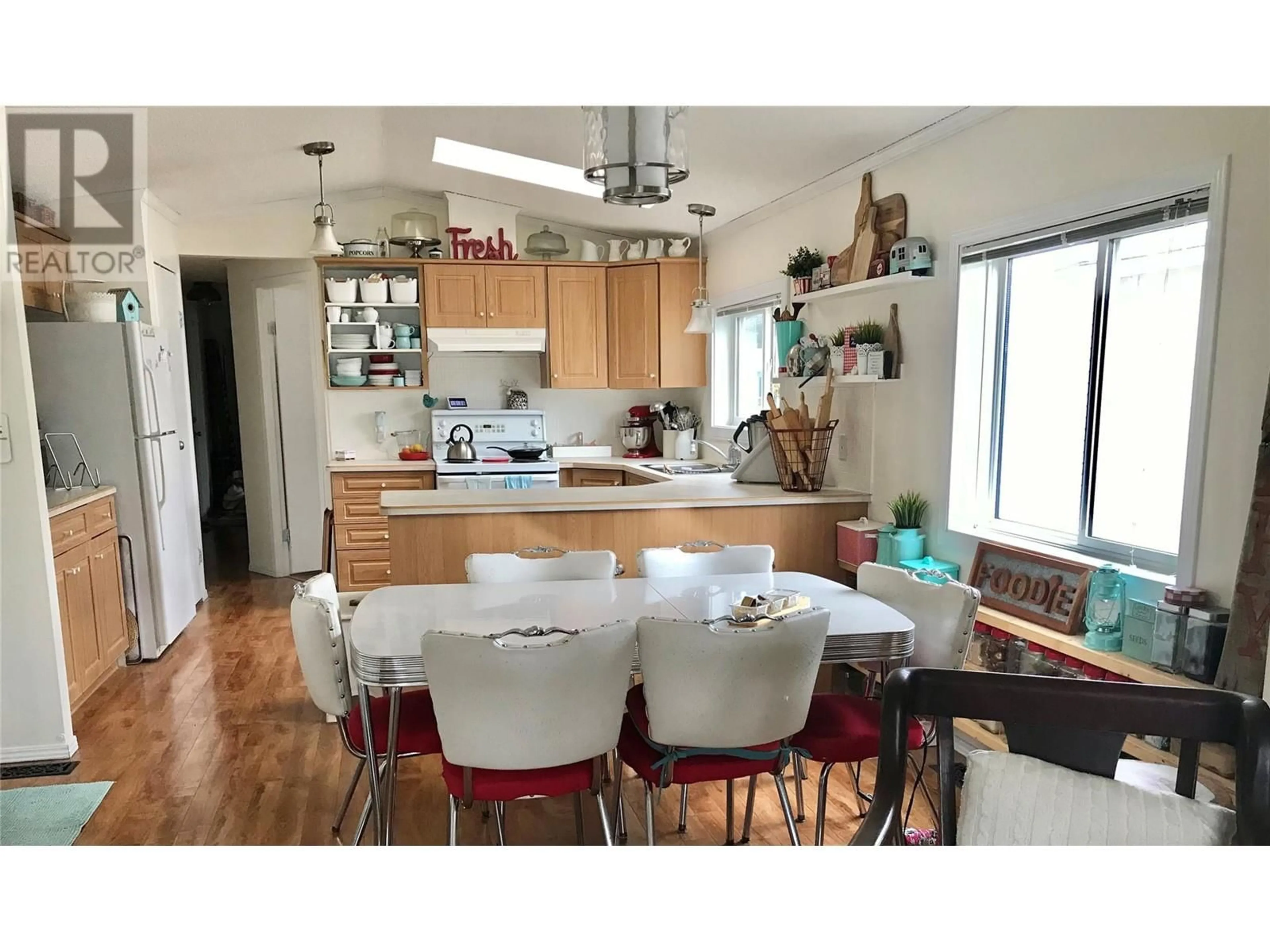 Open concept kitchen, wood/laminate floor for 67 - 263 HWY 3 OTHER, Princeton British Columbia V0X1W0