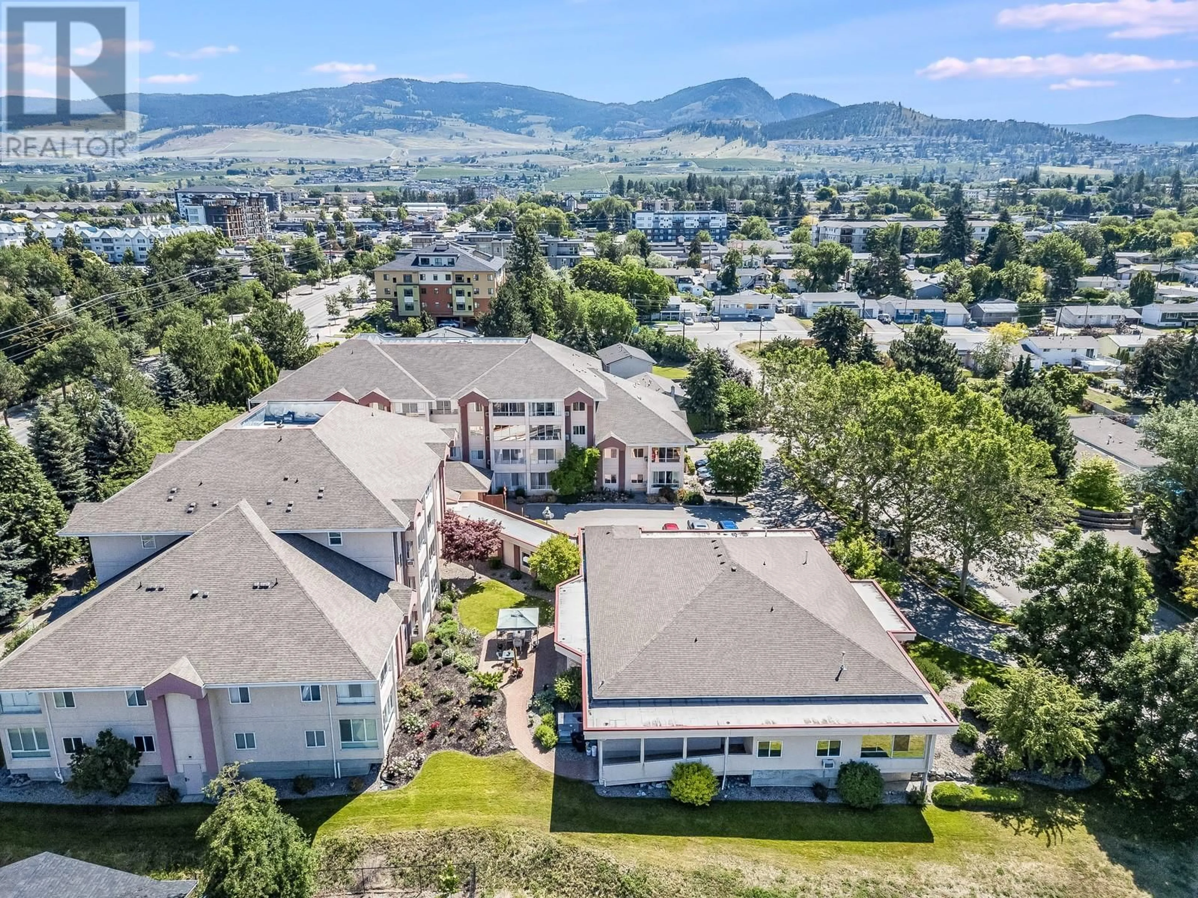 A pic from outside/outdoor area/front of a property/back of a property/a pic from drone, mountain view for 119 - 920 SASKATOON ROAD, Kelowna British Columbia V1X7P8