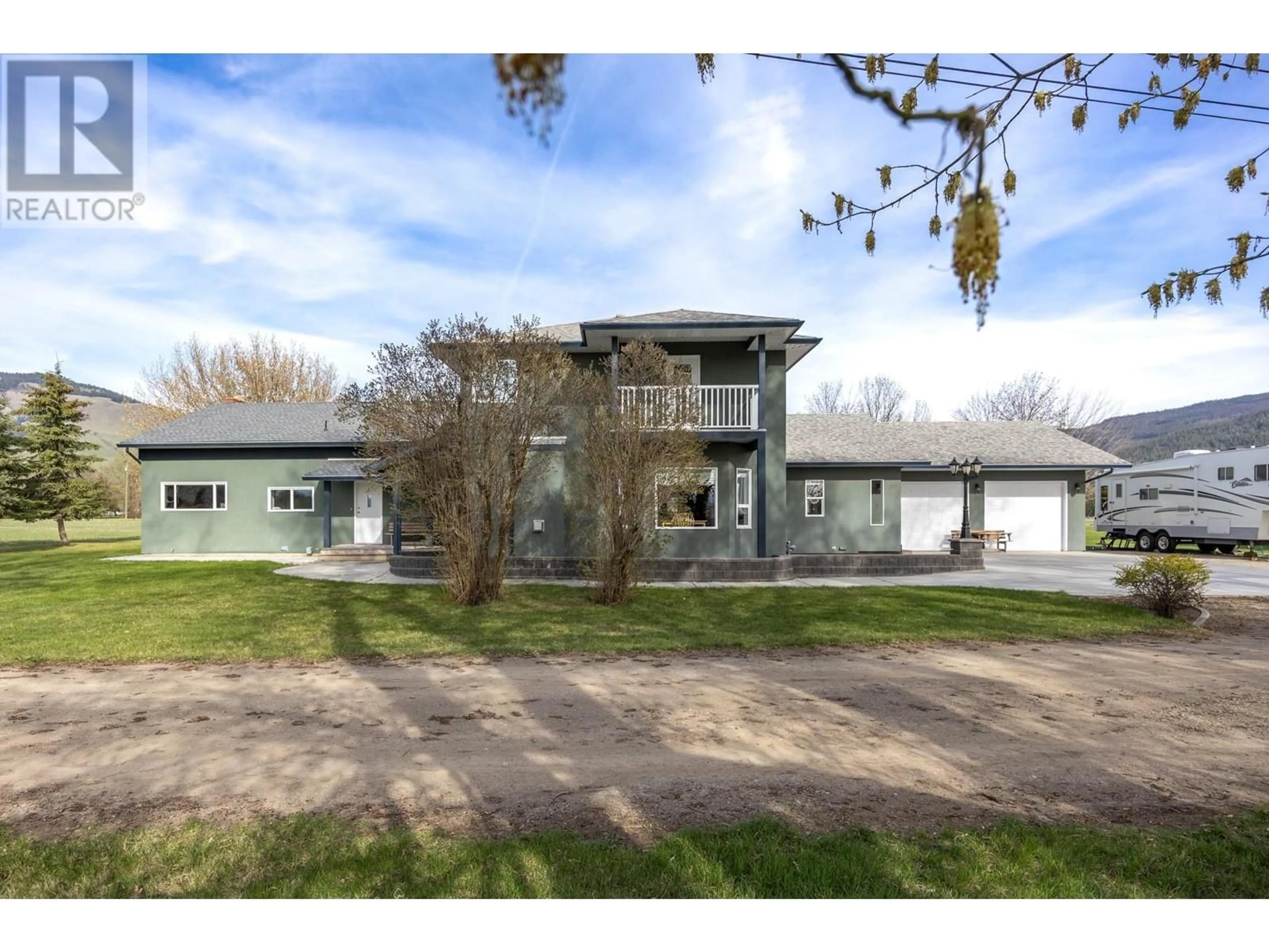 A pic from outside/outdoor area/front of a property/back of a property/a pic from drone, building for 9050 KALAMALKA ROAD, Coldstream British Columbia V1B3C3