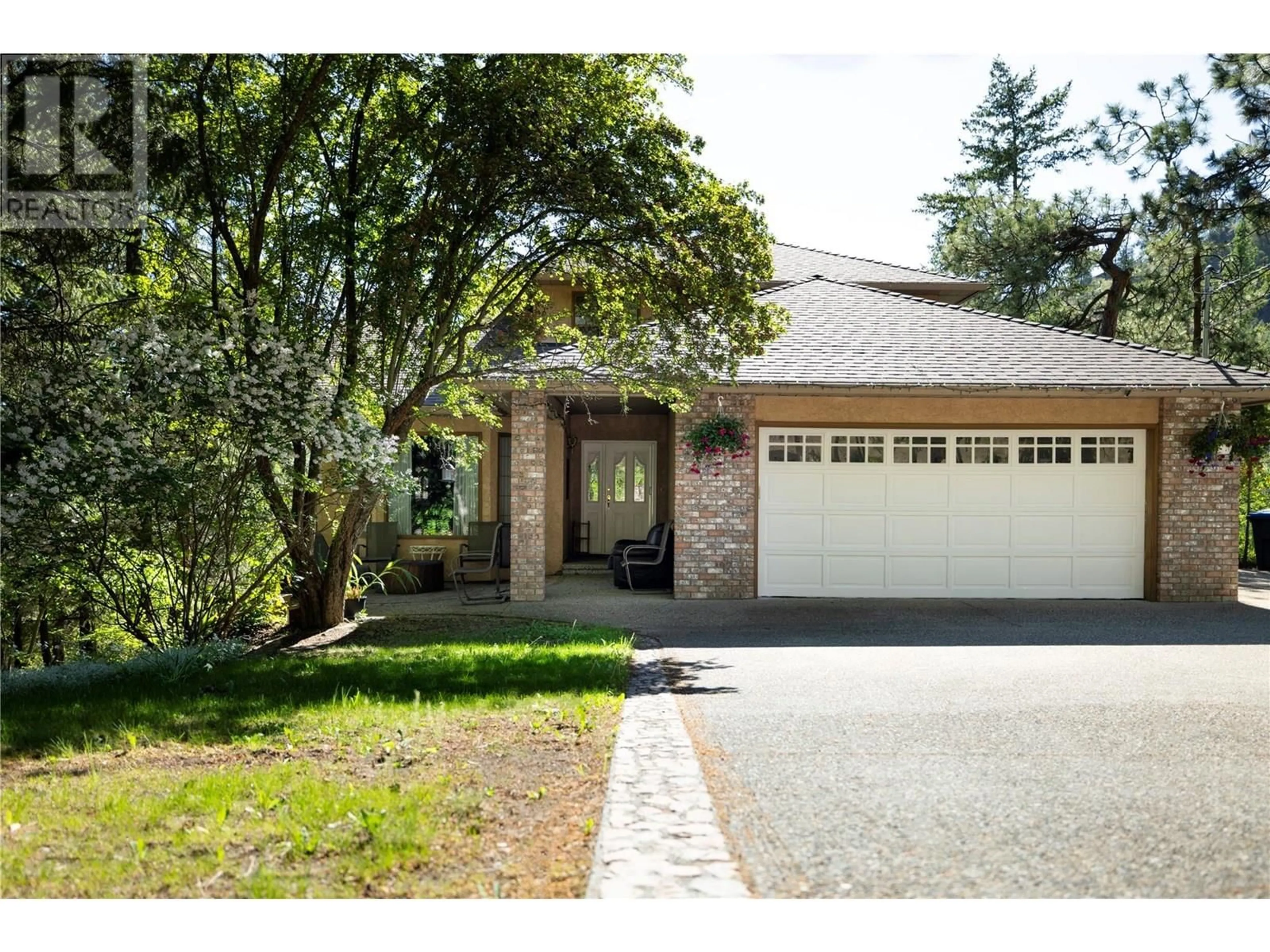 Home with brick exterior material, street for GRAINGER ROAD, Kelowna British Columbia V1V1C8
