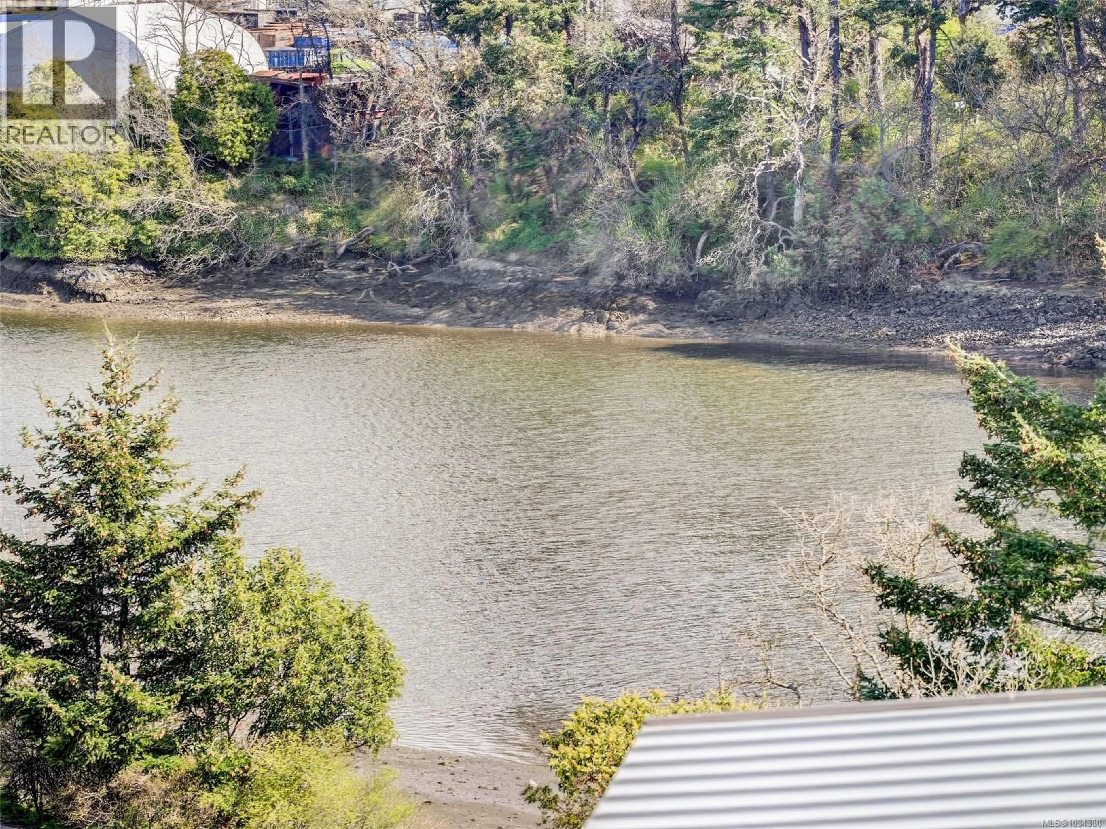 A pic from outside/outdoor area/front of a property/back of a property/a pic from drone, water/lake/river/ocean view for 403 - 757 TYEE ROAD, Victoria British Columbia V9A7P7