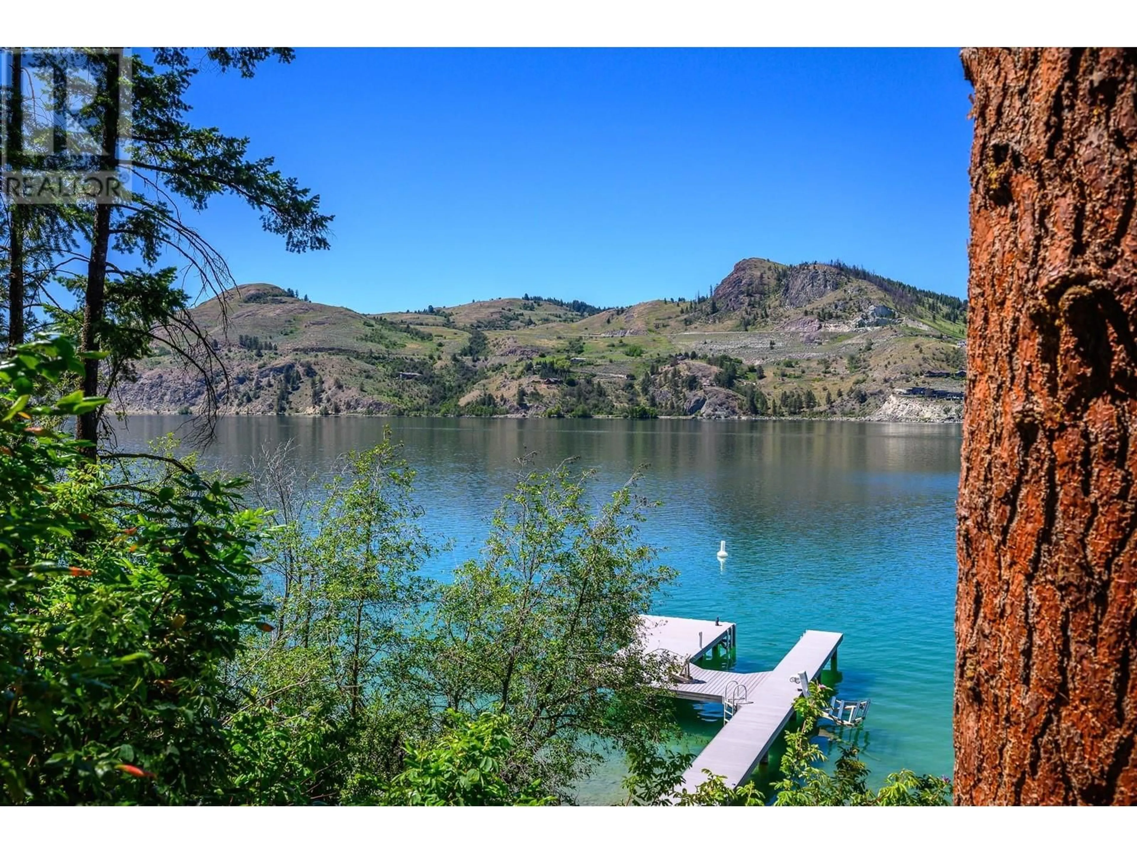 A pic from outside/outdoor area/front of a property/back of a property/a pic from drone, water/lake/river/ocean view for 5 - 12877 KIDSTON ROAD, Coldstream British Columbia V1B1Z4