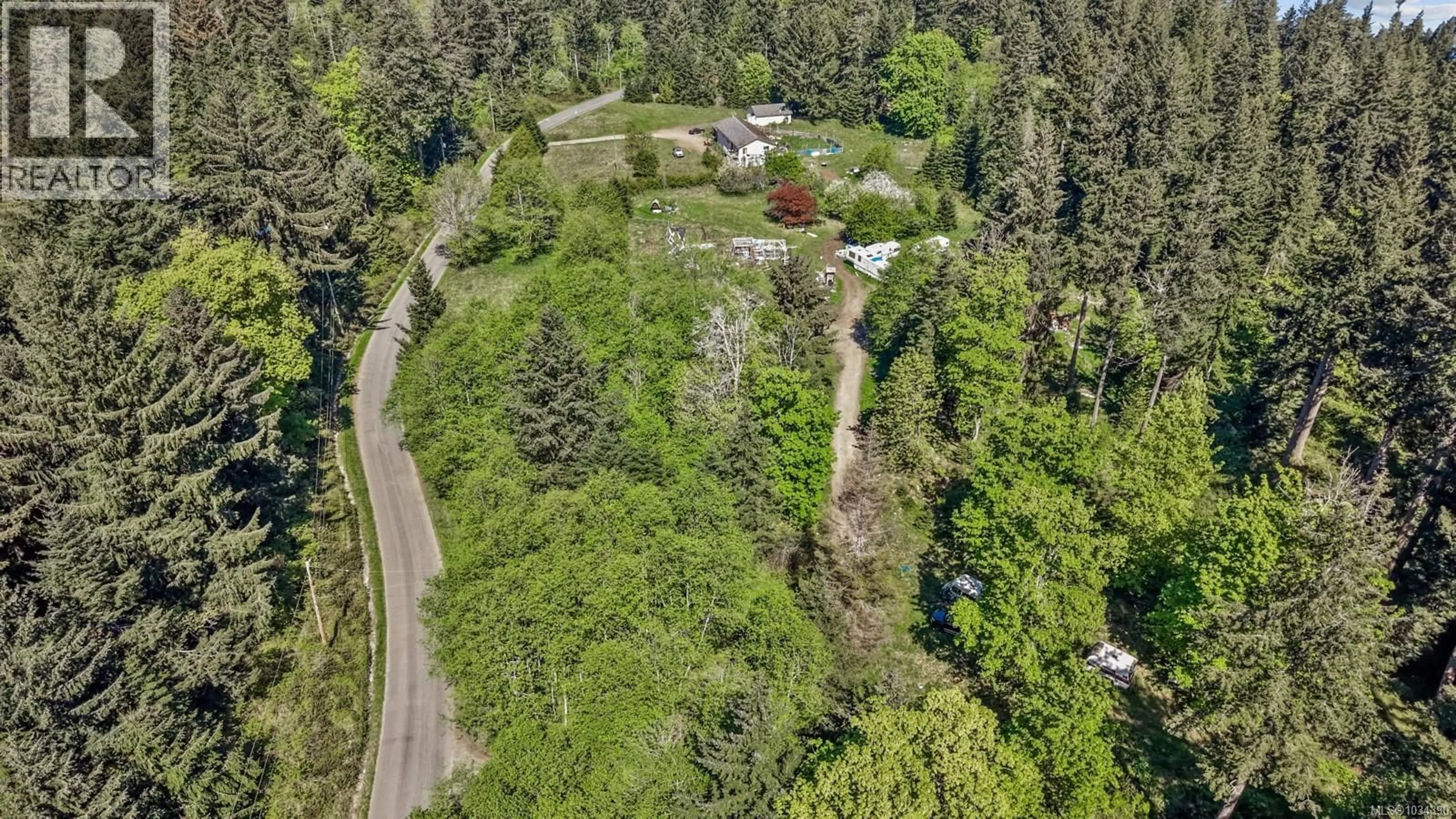 A pic from outside/outdoor area/front of a property/back of a property/a pic from drone, unknown for 264 SUTIL ROAD, Quadra Island British Columbia V0P0A8