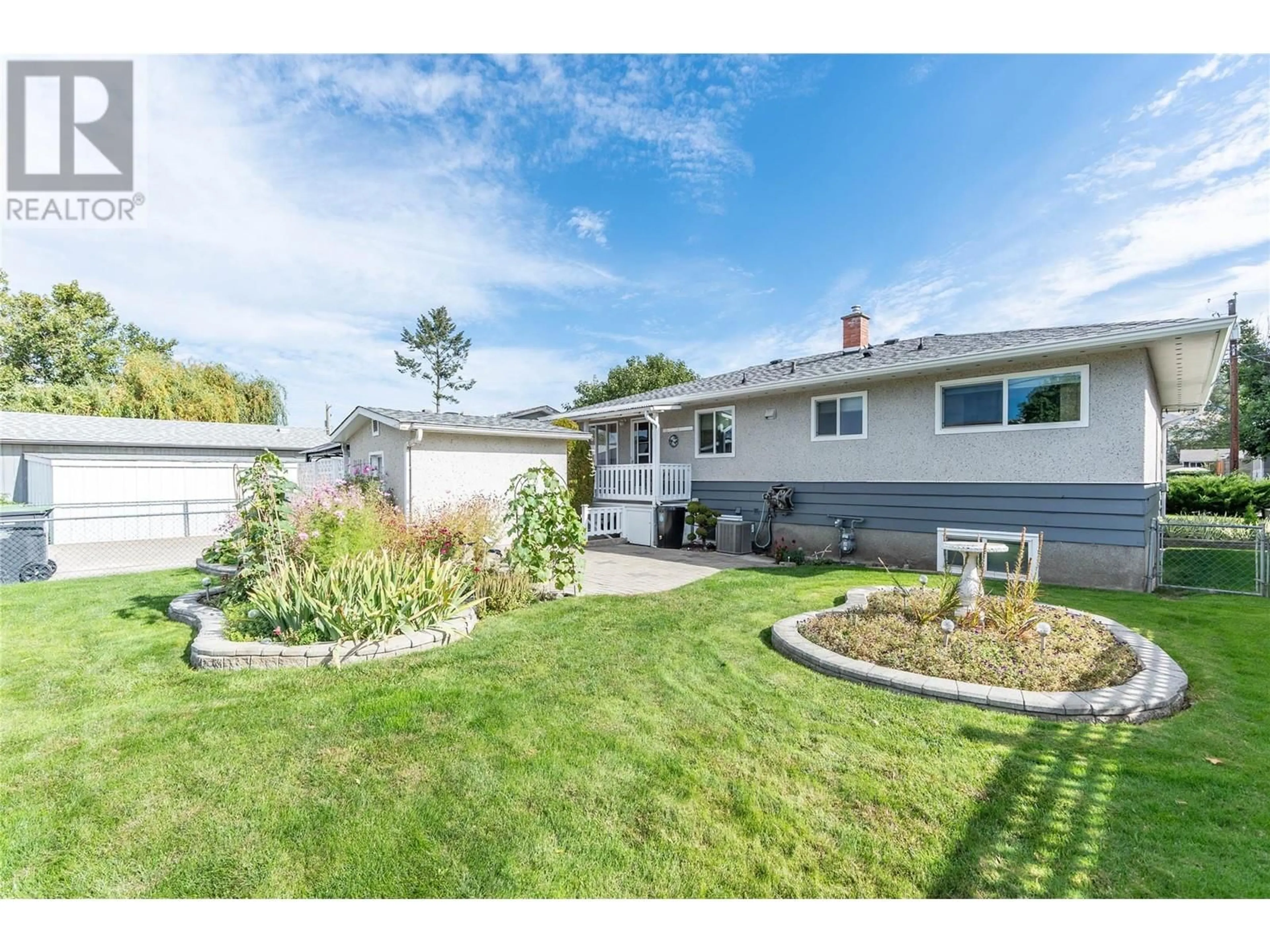 A pic from outside/outdoor area/front of a property/back of a property/a pic from drone, street for 500 MCDONALD ROAD, Kelowna British Columbia V1X3H2