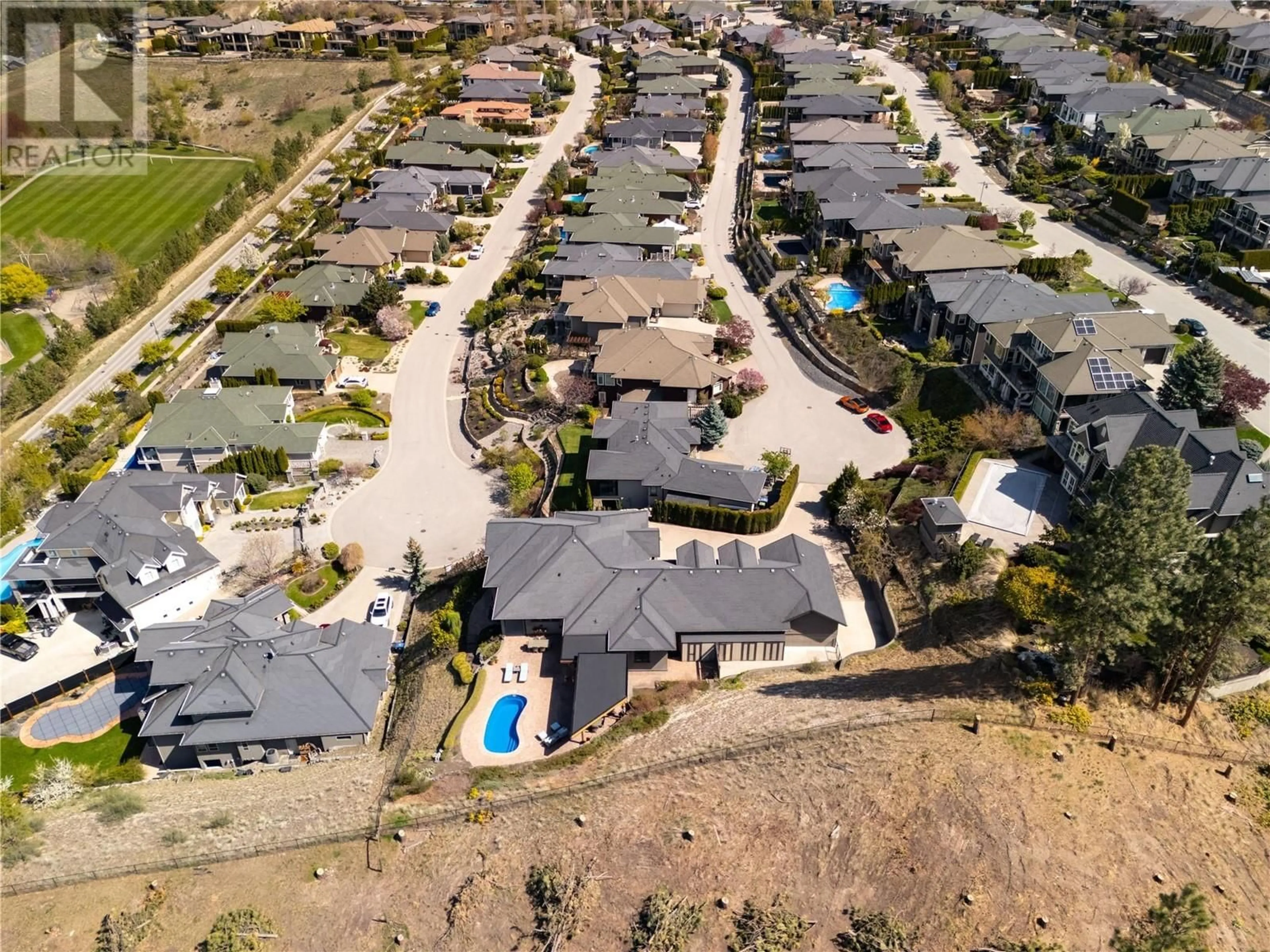 A pic from outside/outdoor area/front of a property/back of a property/a pic from drone, street for 605 ALMANDINE COURT, Kelowna British Columbia V1W4Z5