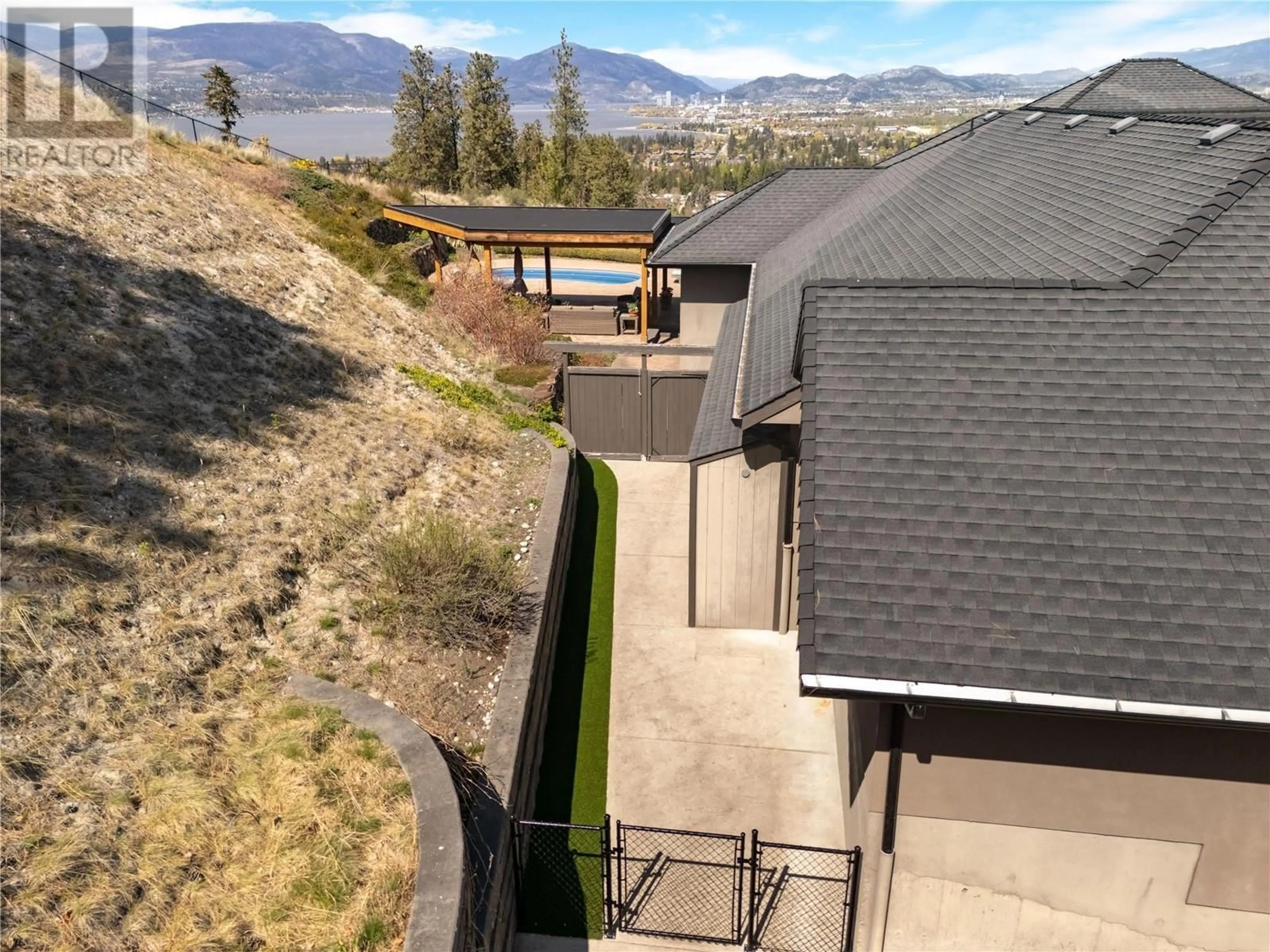 A pic from outside/outdoor area/front of a property/back of a property/a pic from drone, mountain view for 605 ALMANDINE COURT, Kelowna British Columbia V1W4Z5