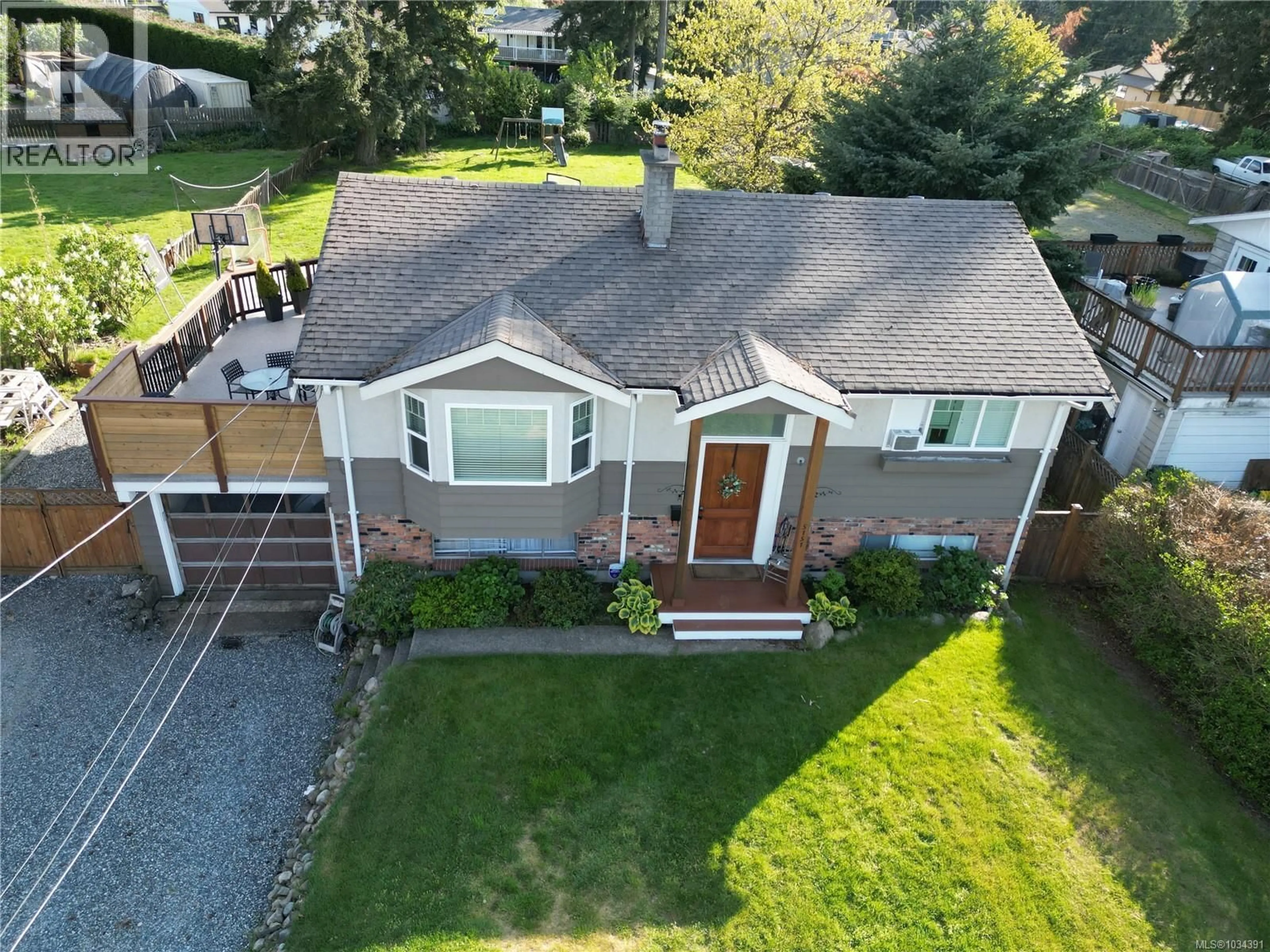 A pic from outside/outdoor area/front of a property/back of a property/a pic from drone, street for 5151 METRAL DRIVE, Nanaimo British Columbia V9T2K7