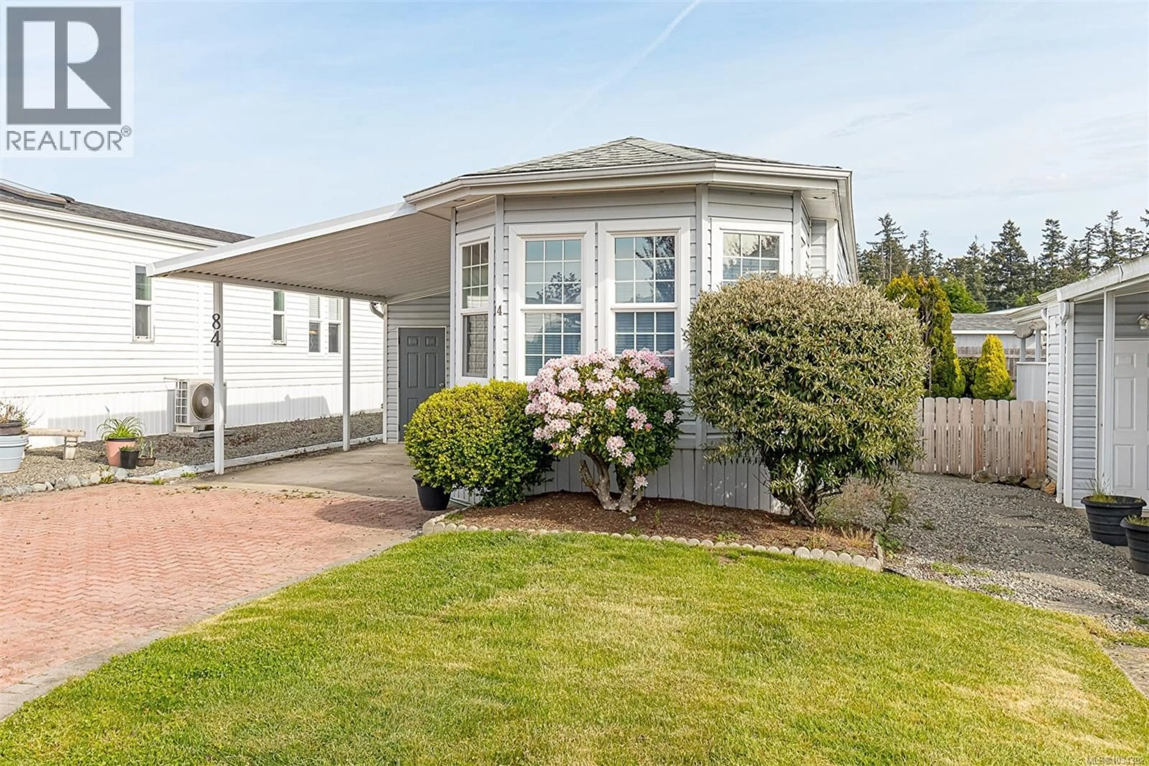 Home with vinyl exterior material, street for 84 - 7583 CENTRAL SAANICH ROAD, Central Saanich British Columbia V8M2B6
