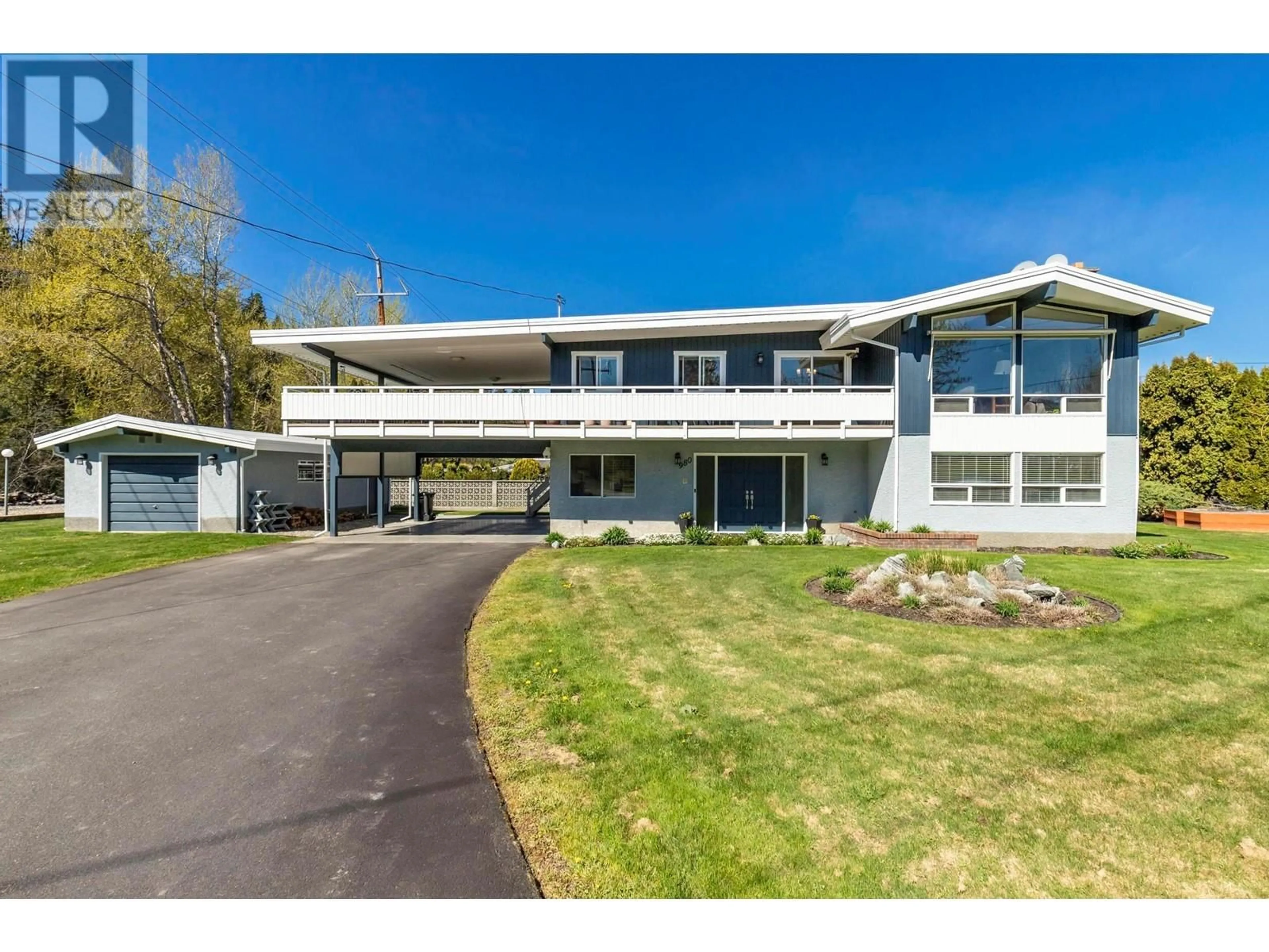 A pic from outside/outdoor area/front of a property/back of a property/a pic from drone, unknown for 980 GERSTMAR ROAD, Kelowna British Columbia V1X4B8