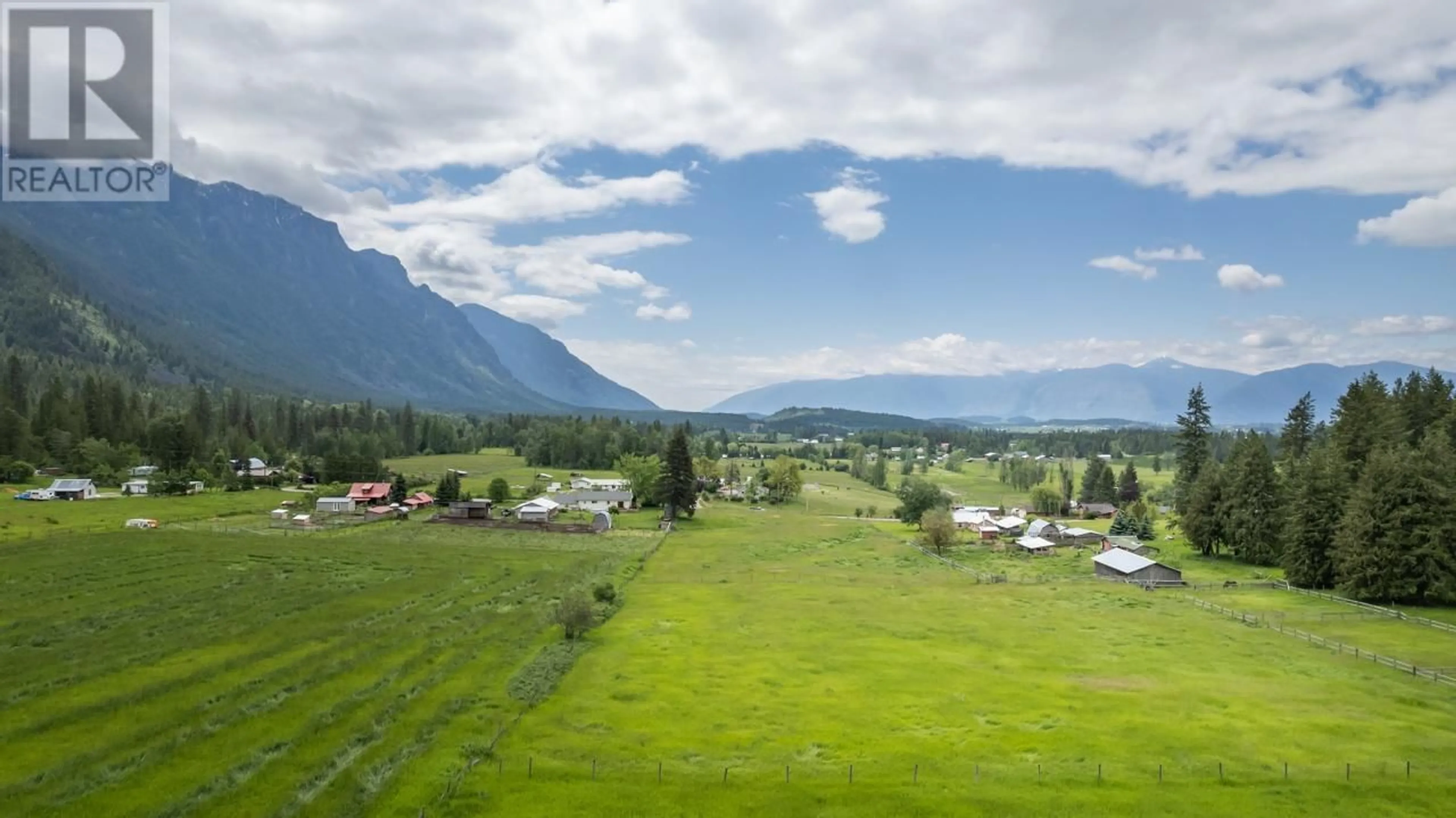 A pic from outside/outdoor area/front of a property/back of a property/a pic from drone, mountain view for 4512 48TH STREET, Canyon British Columbia V0B1C1