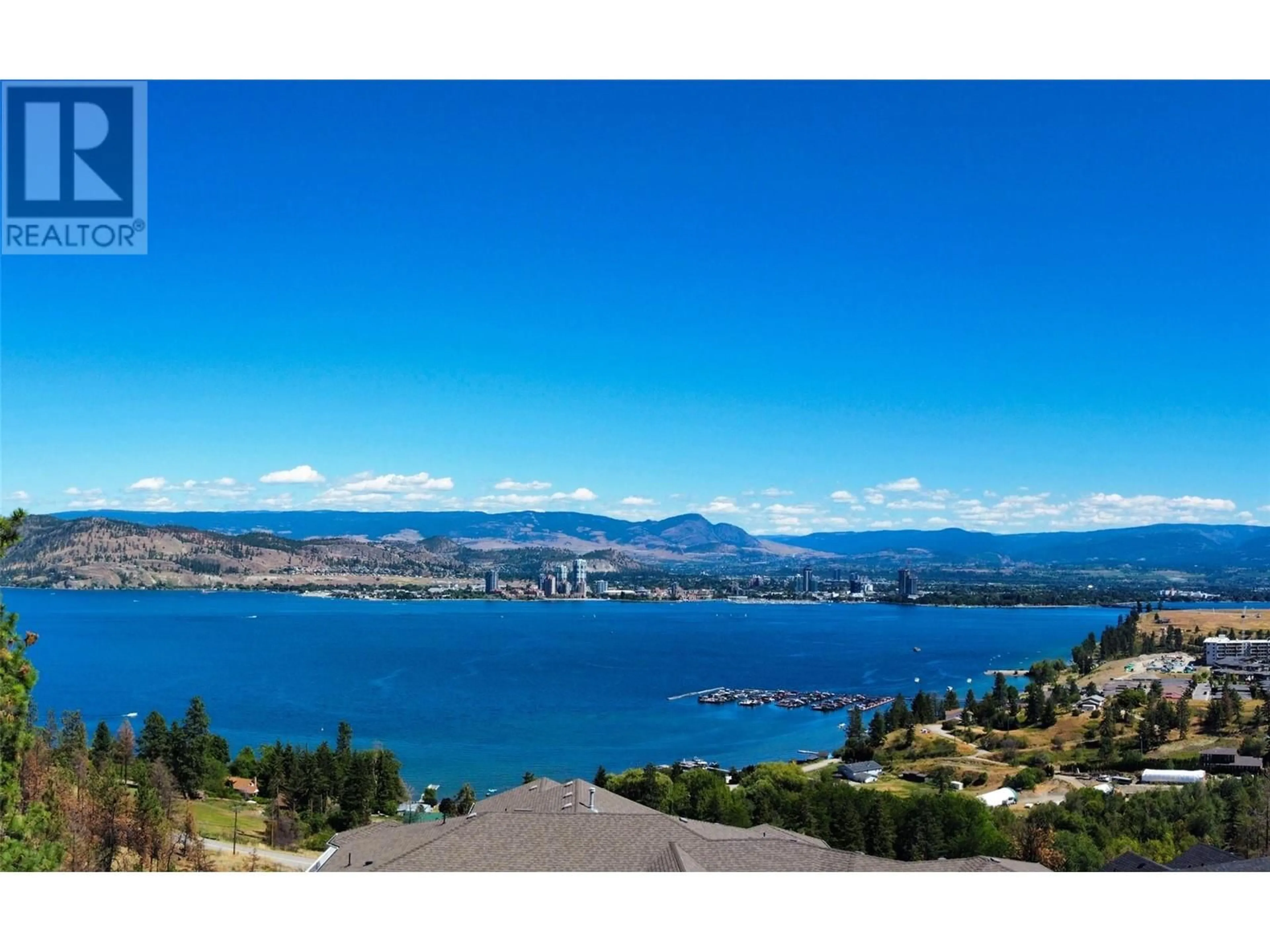 A pic from outside/outdoor area/front of a property/back of a property/a pic from drone, water/lake/river/ocean view for 1525 BEAR CREEK ROAD, West Kelowna British Columbia V1Z3R6