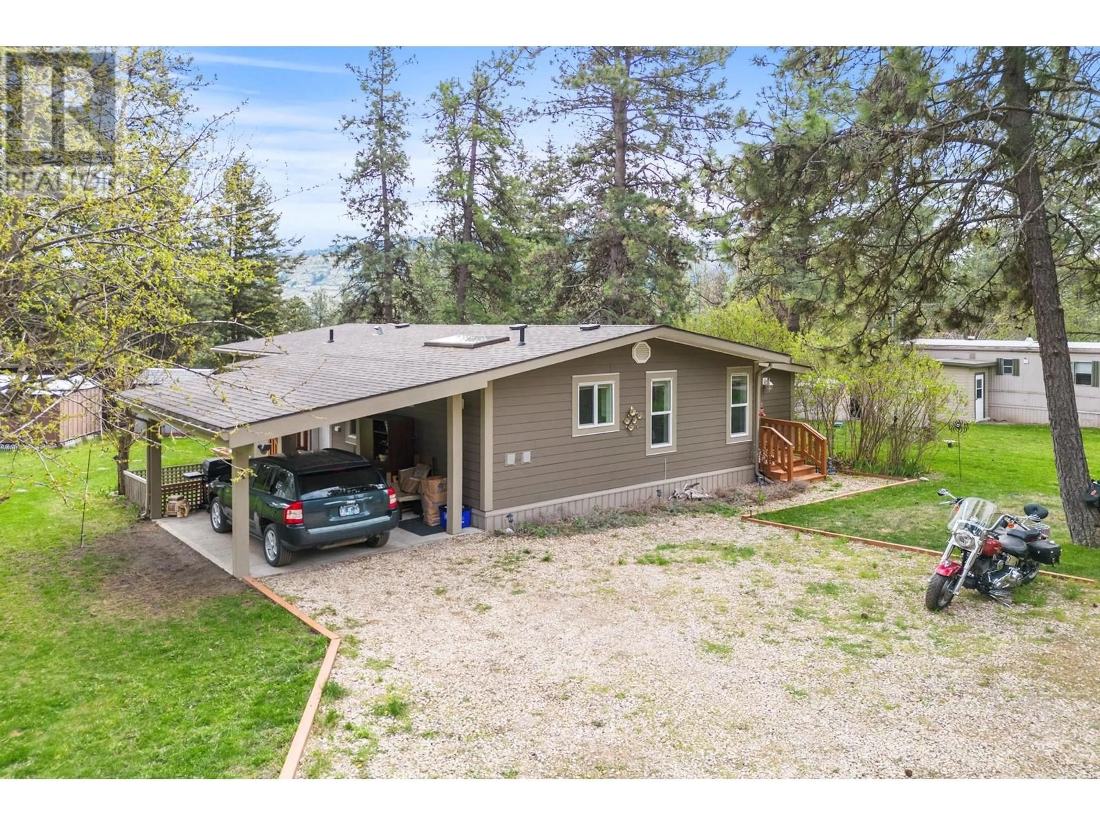 A pic from outside/outdoor area/front of a property/back of a property/a pic from drone, unknown for 4 - 12069 WESTSIDE ROAD, Vernon British Columbia V1H2A5
