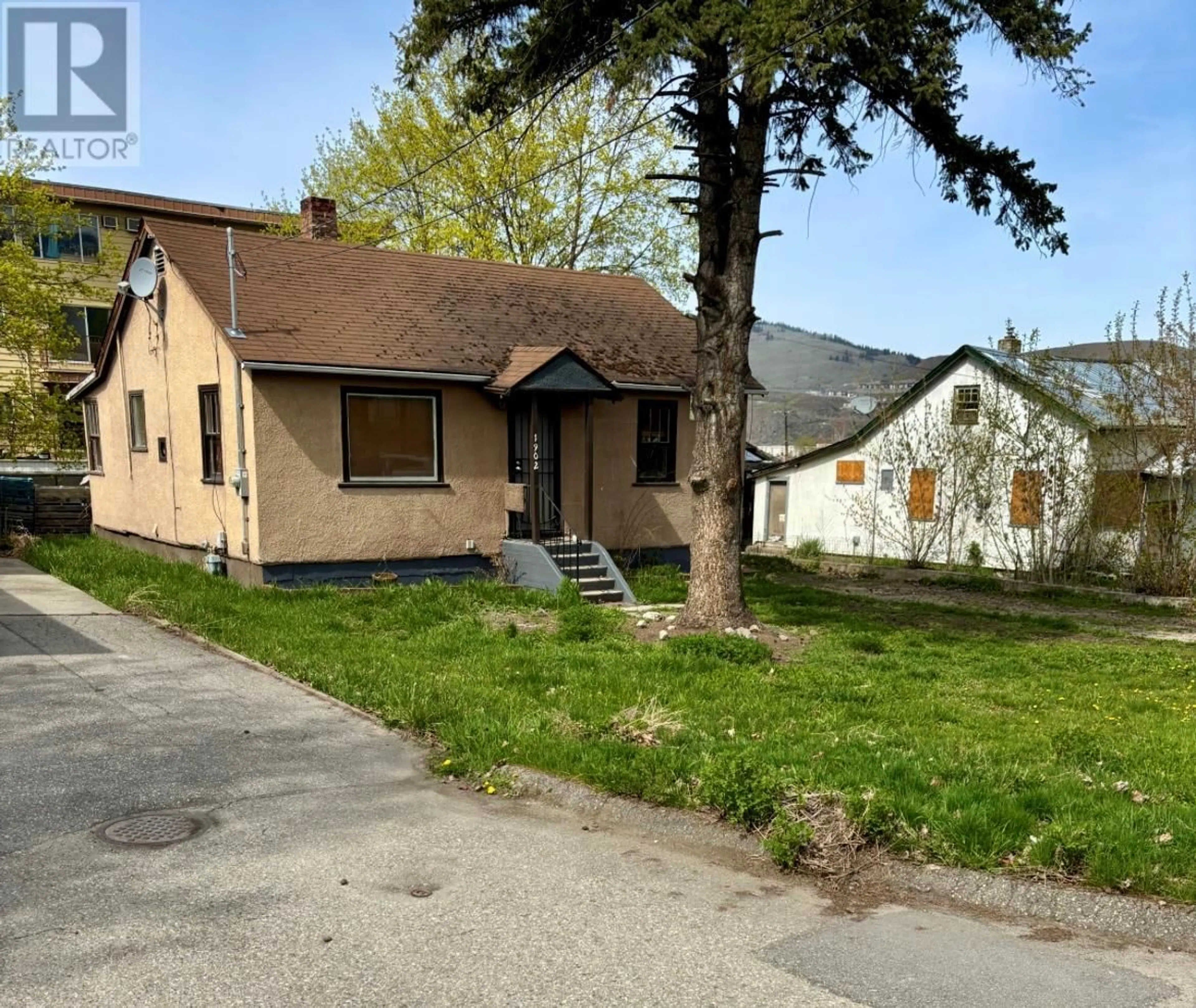 A pic from outside/outdoor area/front of a property/back of a property/a pic from drone, street for 1902 31 STREET, Vernon British Columbia V1T5G9