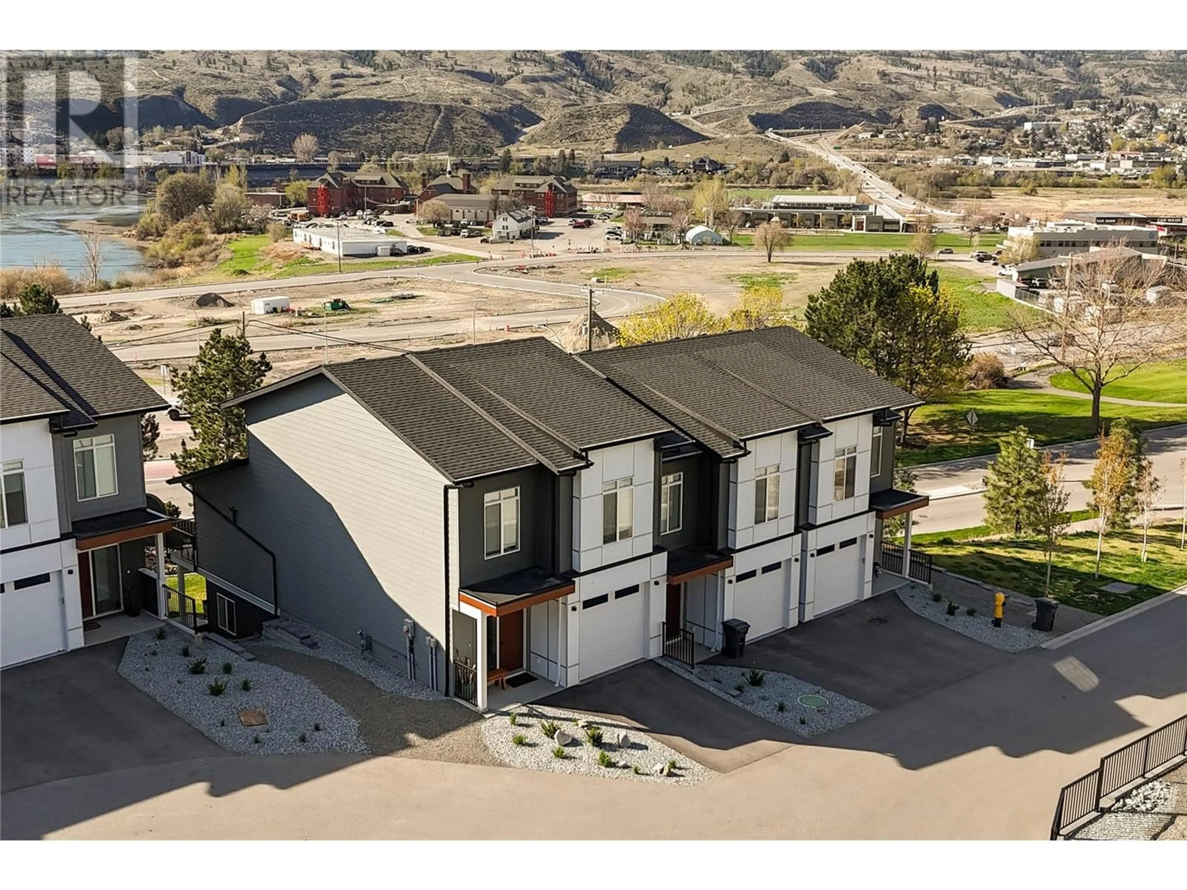 A pic from outside/outdoor area/front of a property/back of a property/a pic from drone, street for 130 RIVER GATE DRIVE, Kamloops British Columbia V2H0E4