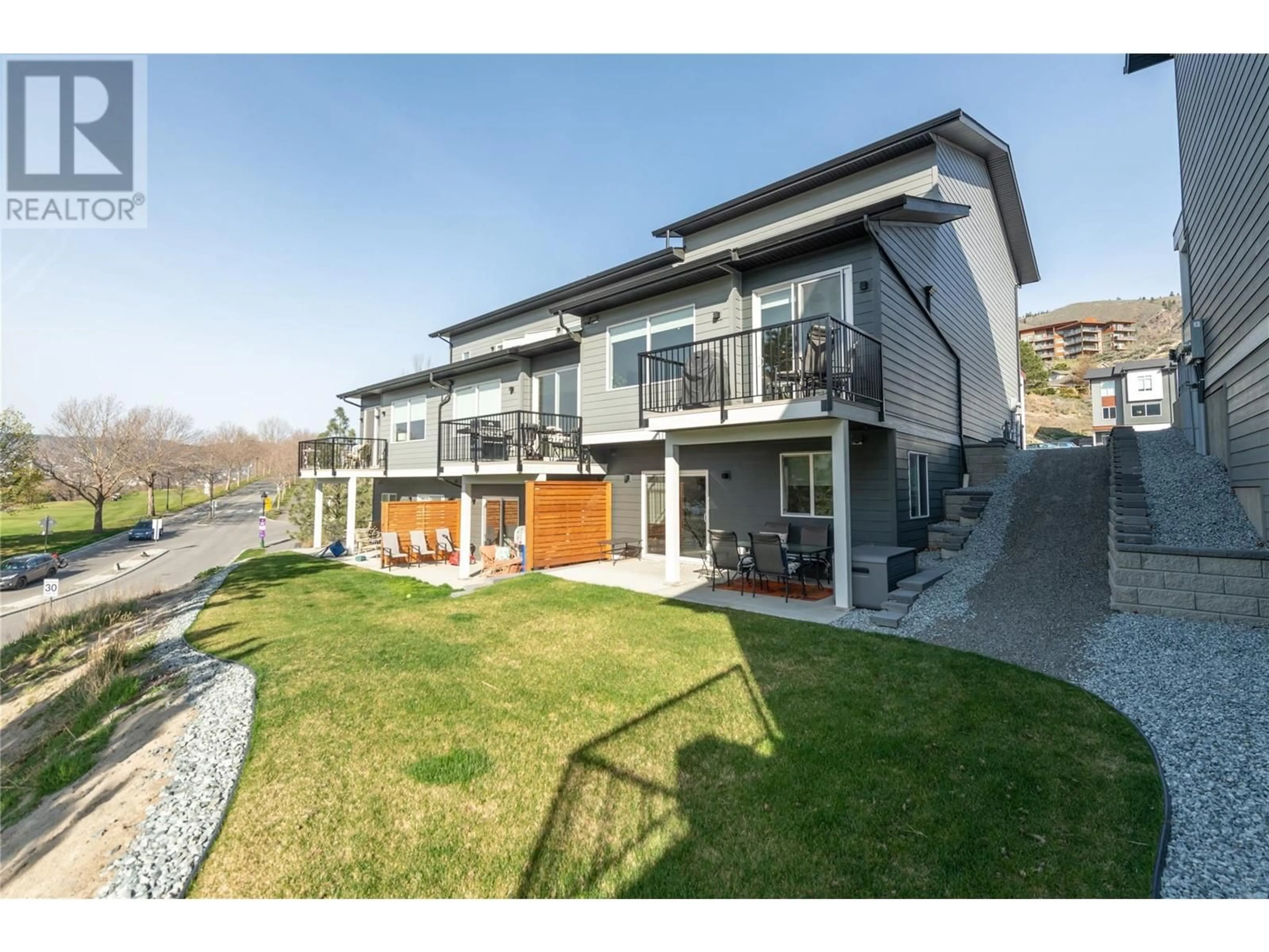 A pic from outside/outdoor area/front of a property/back of a property/a pic from drone, street for 130 RIVER GATE DRIVE, Kamloops British Columbia V2H0E4