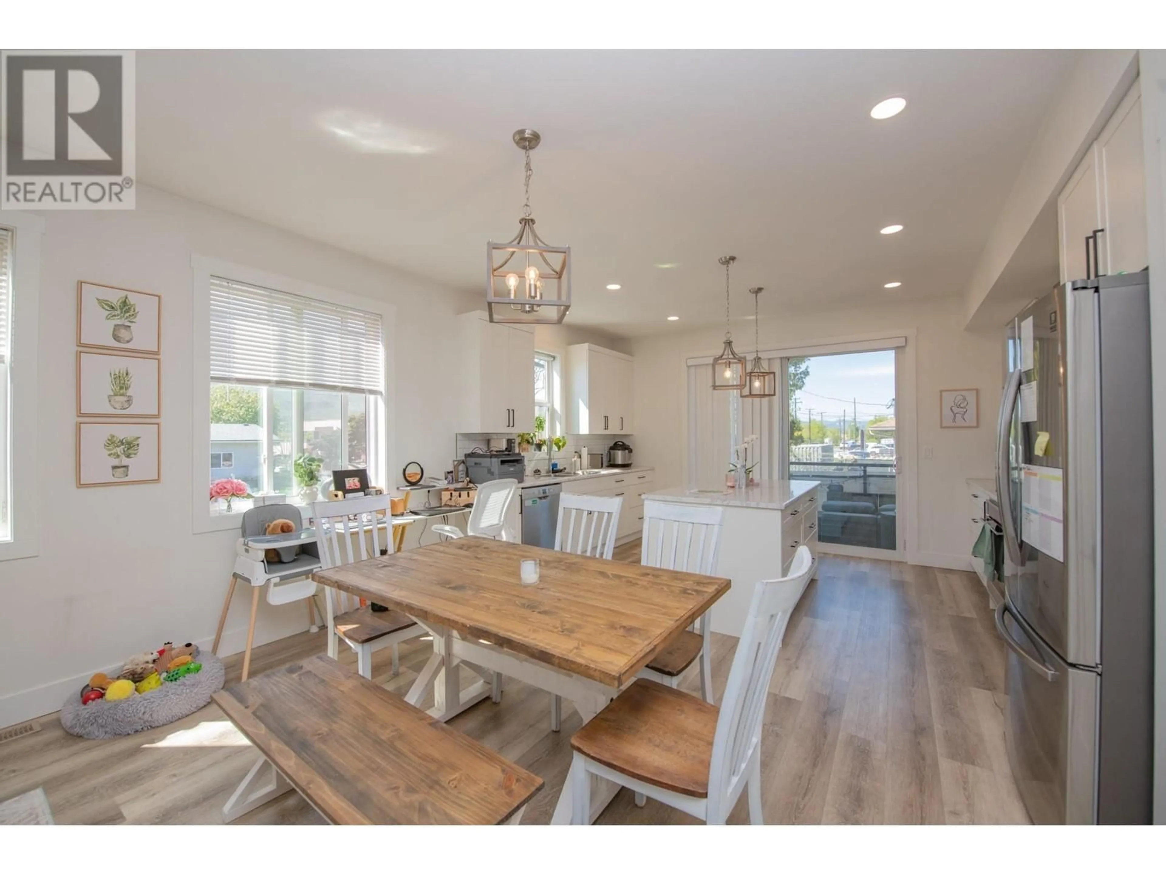 Open concept kitchen, wood/laminate floor for 4503 23 STREET, Vernon British Columbia V1T9J4