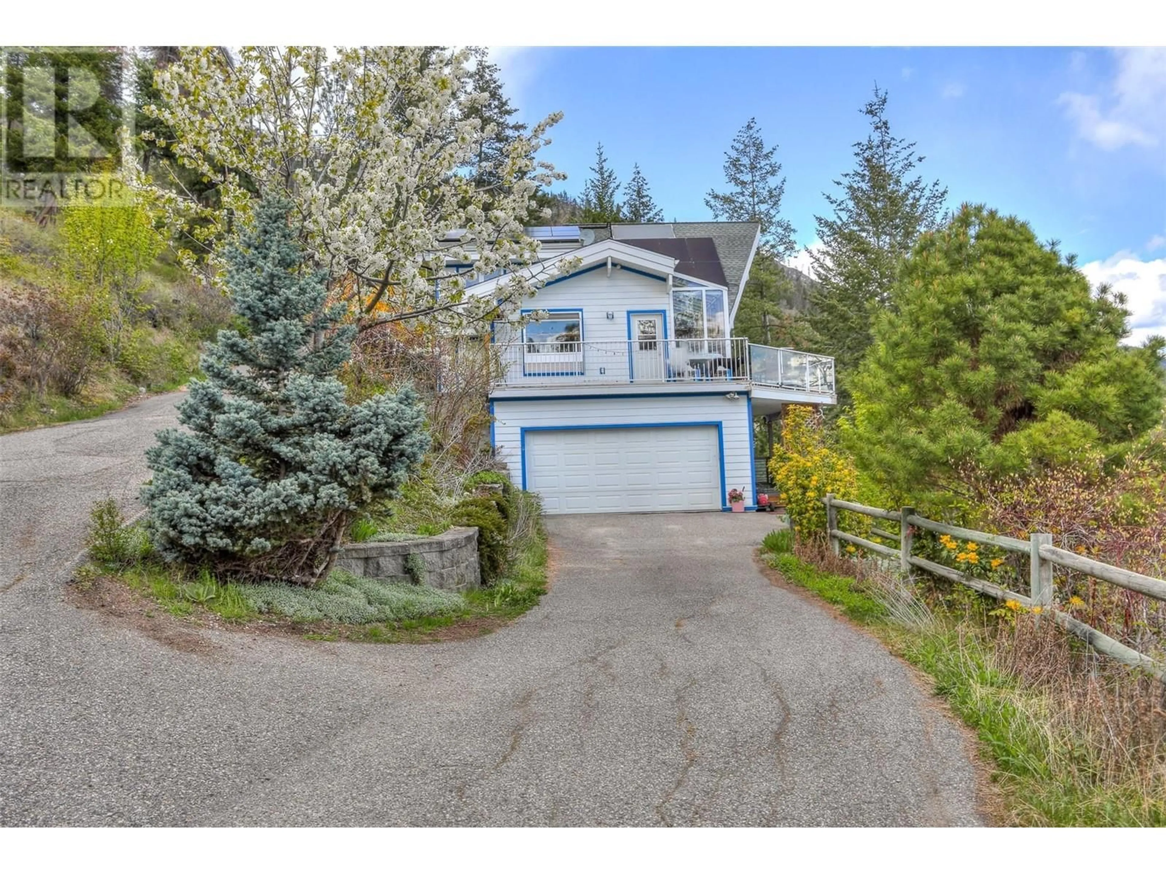 A pic from outside/outdoor area/front of a property/back of a property/a pic from drone, street for 3765 WESTSIDE RD ROAD NORTH, Kelowna British Columbia V1Z3W8