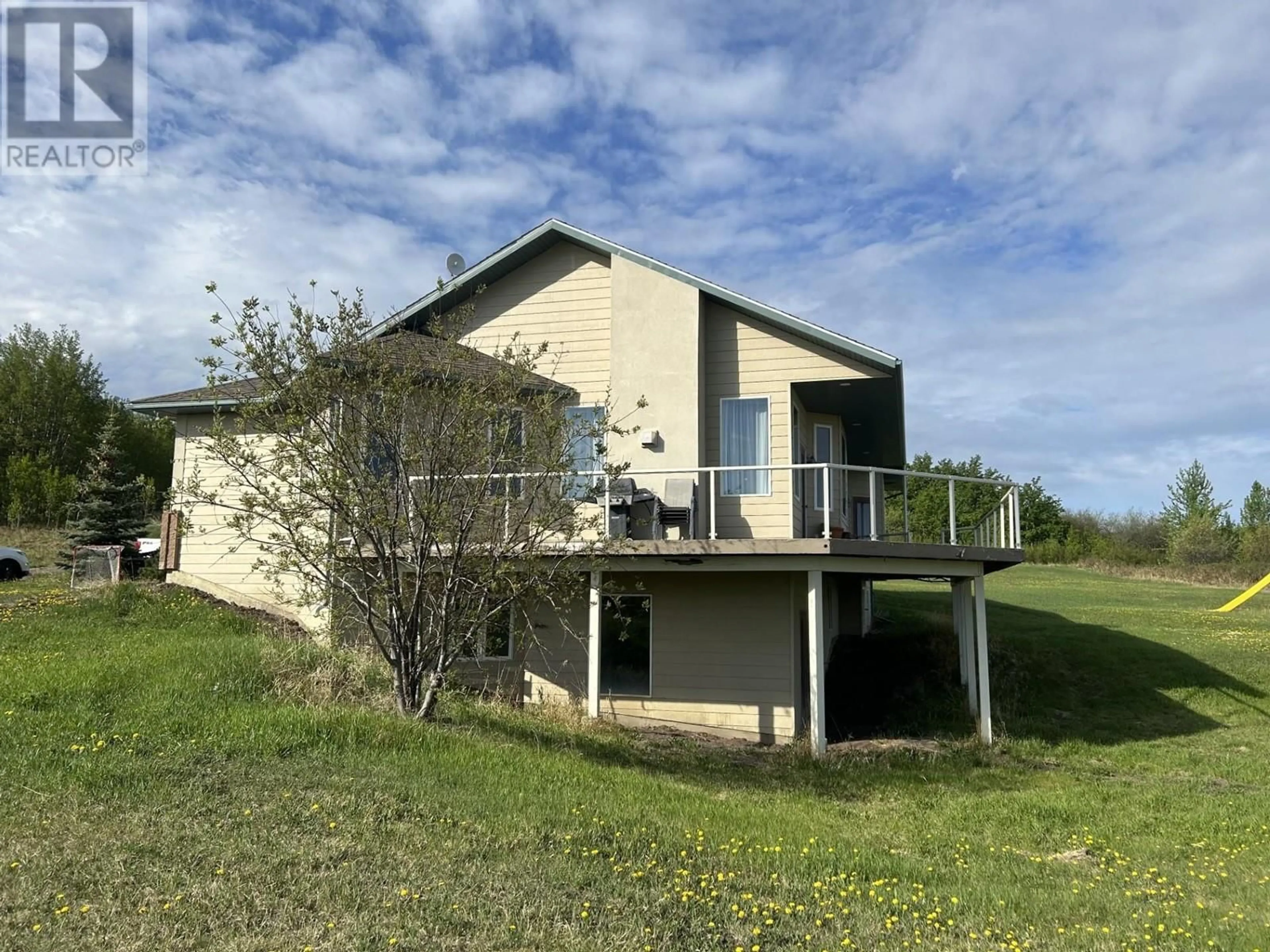 A pic from outside/outdoor area/front of a property/back of a property/a pic from drone, building for 13335 TRAIL WAY OTHER, Dawson Creek British Columbia V1G0H3