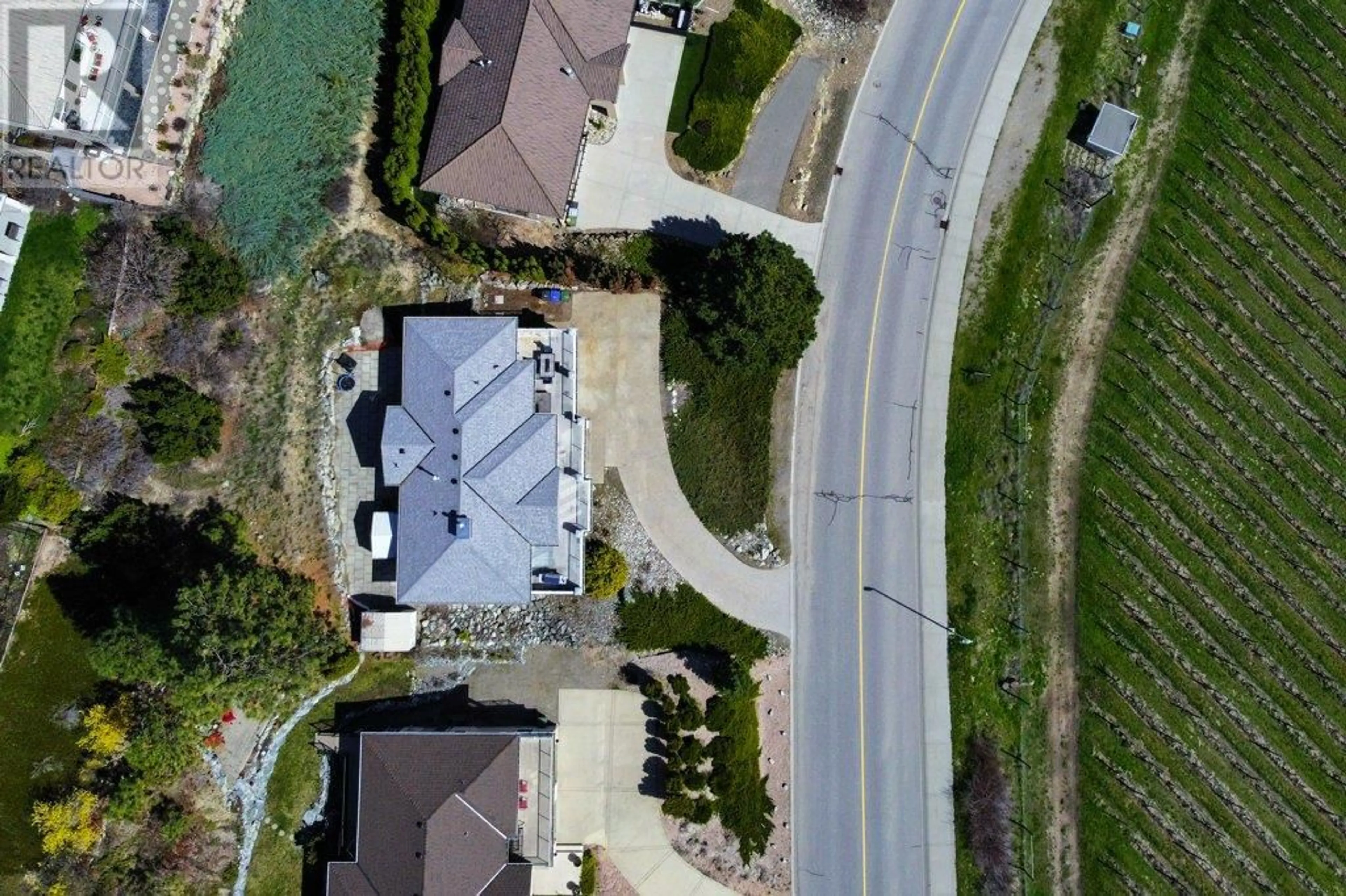 A pic from outside/outdoor area/front of a property/back of a property/a pic from drone, street for 1608 MISSION HILL ROAD, West Kelowna British Columbia V4T2M4