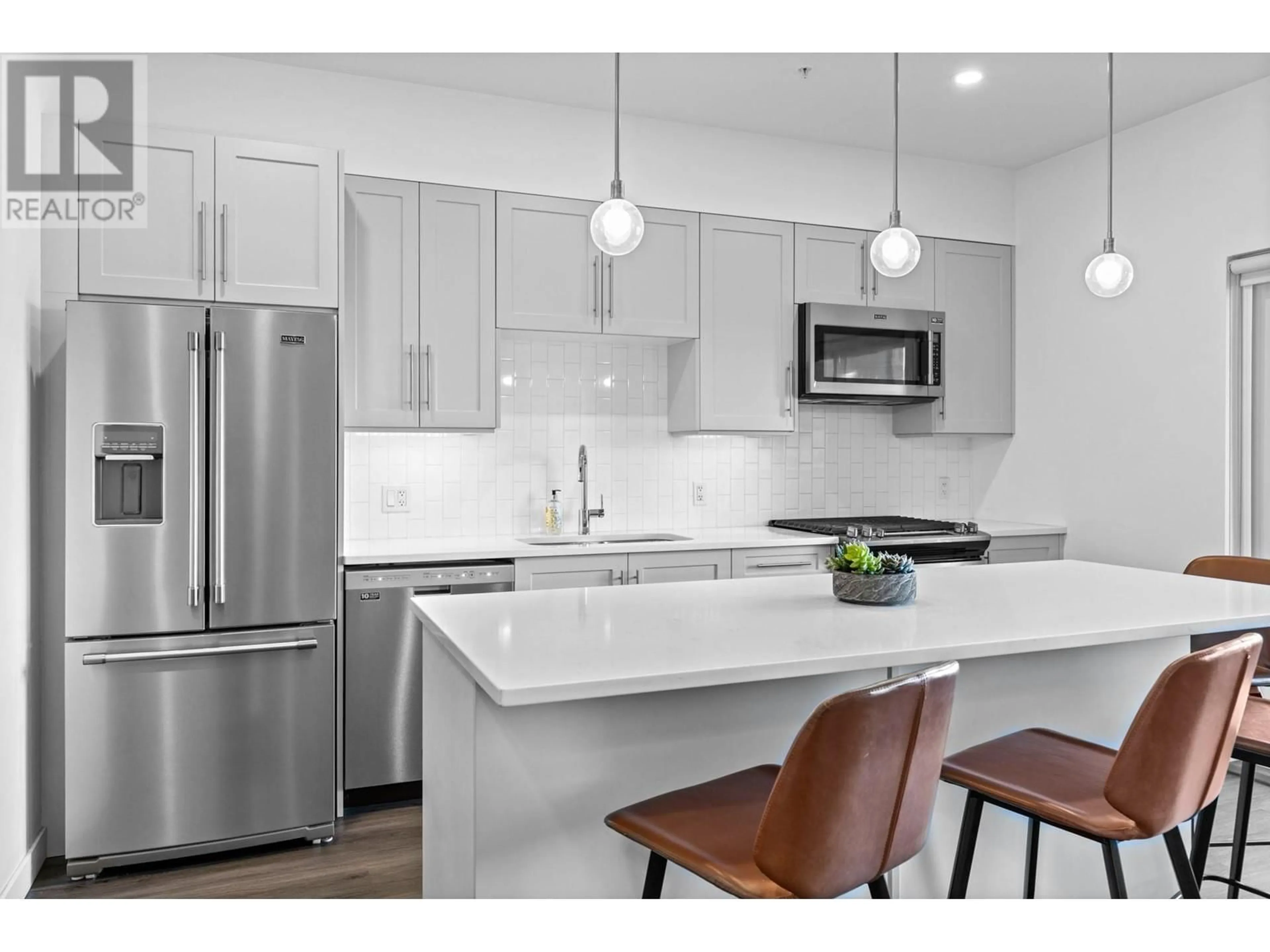 Open concept kitchen, unknown for 404 - 3630 MISSION SPRINGS DRIVE, Kelowna British Columbia V1W0B2