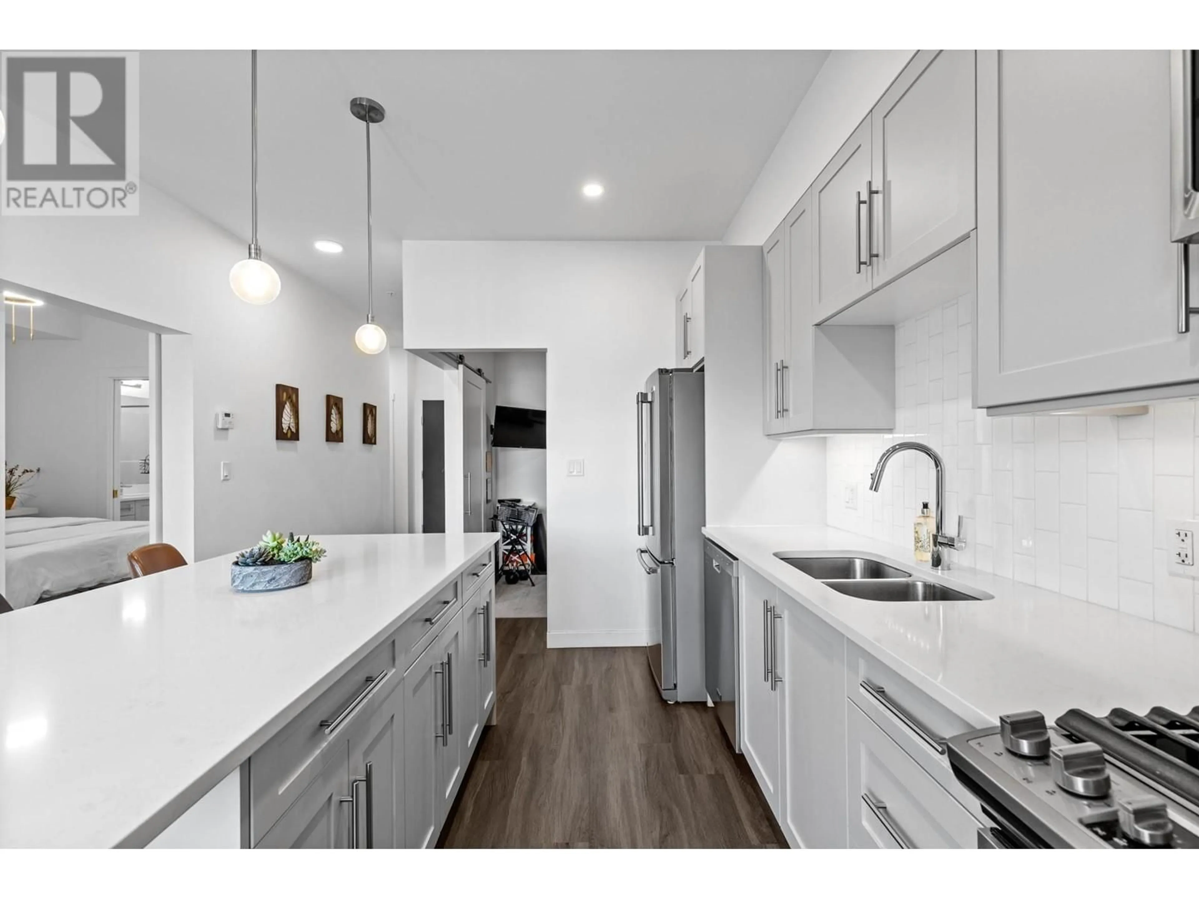 Open concept kitchen, unknown for 404 - 3630 MISSION SPRINGS DRIVE, Kelowna British Columbia V1W0B2
