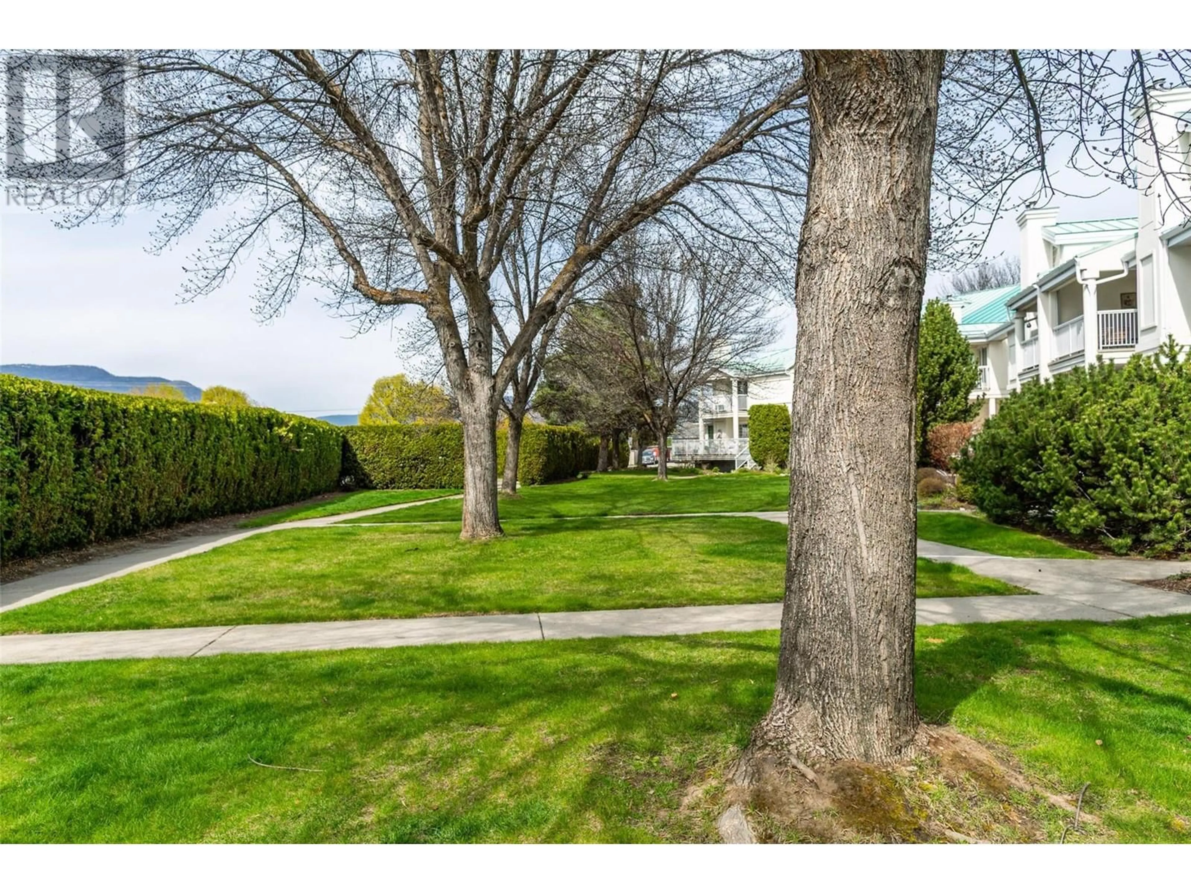 A pic from outside/outdoor area/front of a property/back of a property/a pic from drone, street for 216 - 2350 STILLINGFLEET ROAD, Kelowna British Columbia V1W3X9