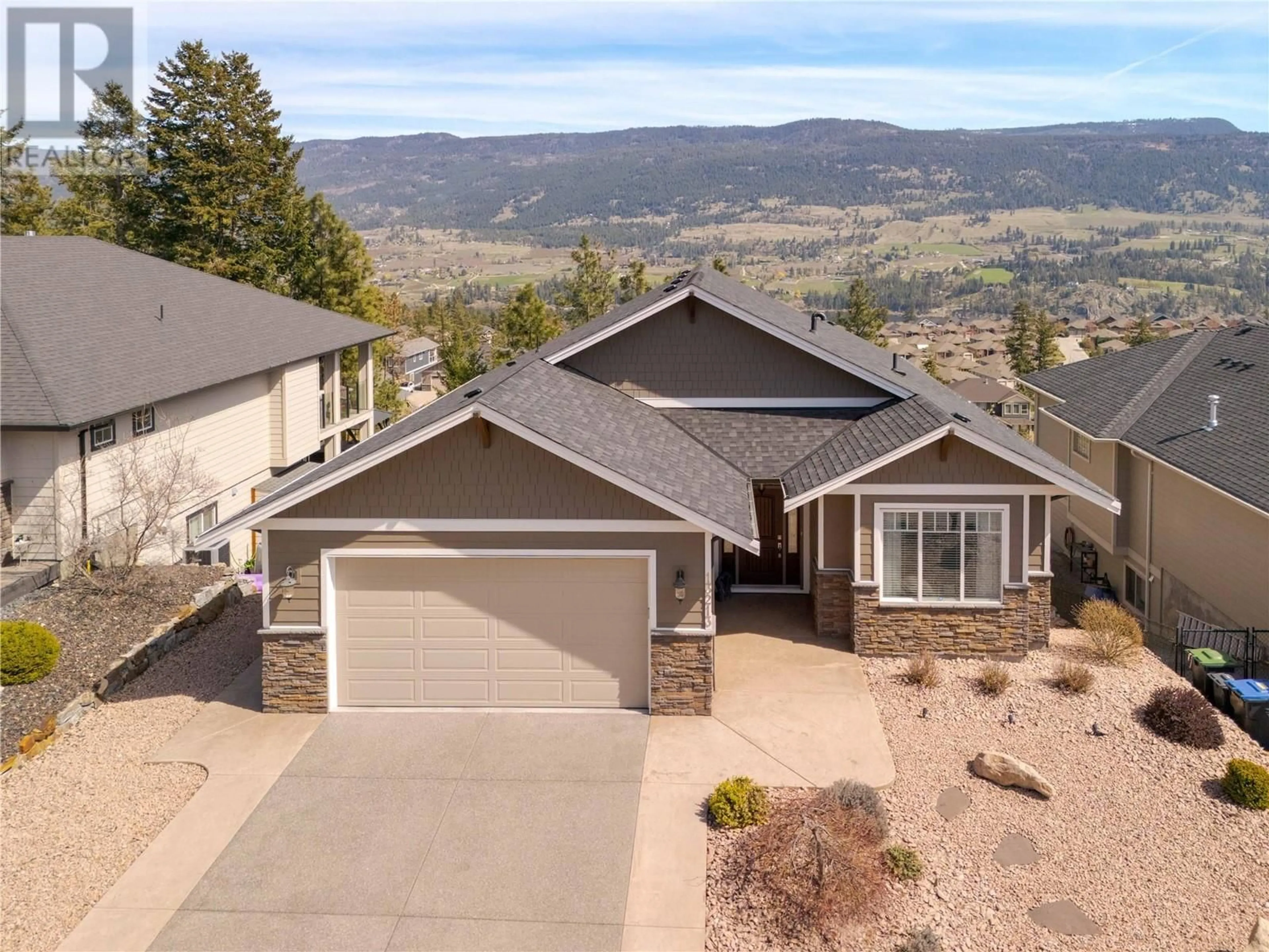 A pic from outside/outdoor area/front of a property/back of a property/a pic from drone, mountain view for 13213 APEX CRESCENT, Lake Country British Columbia V4V2W1
