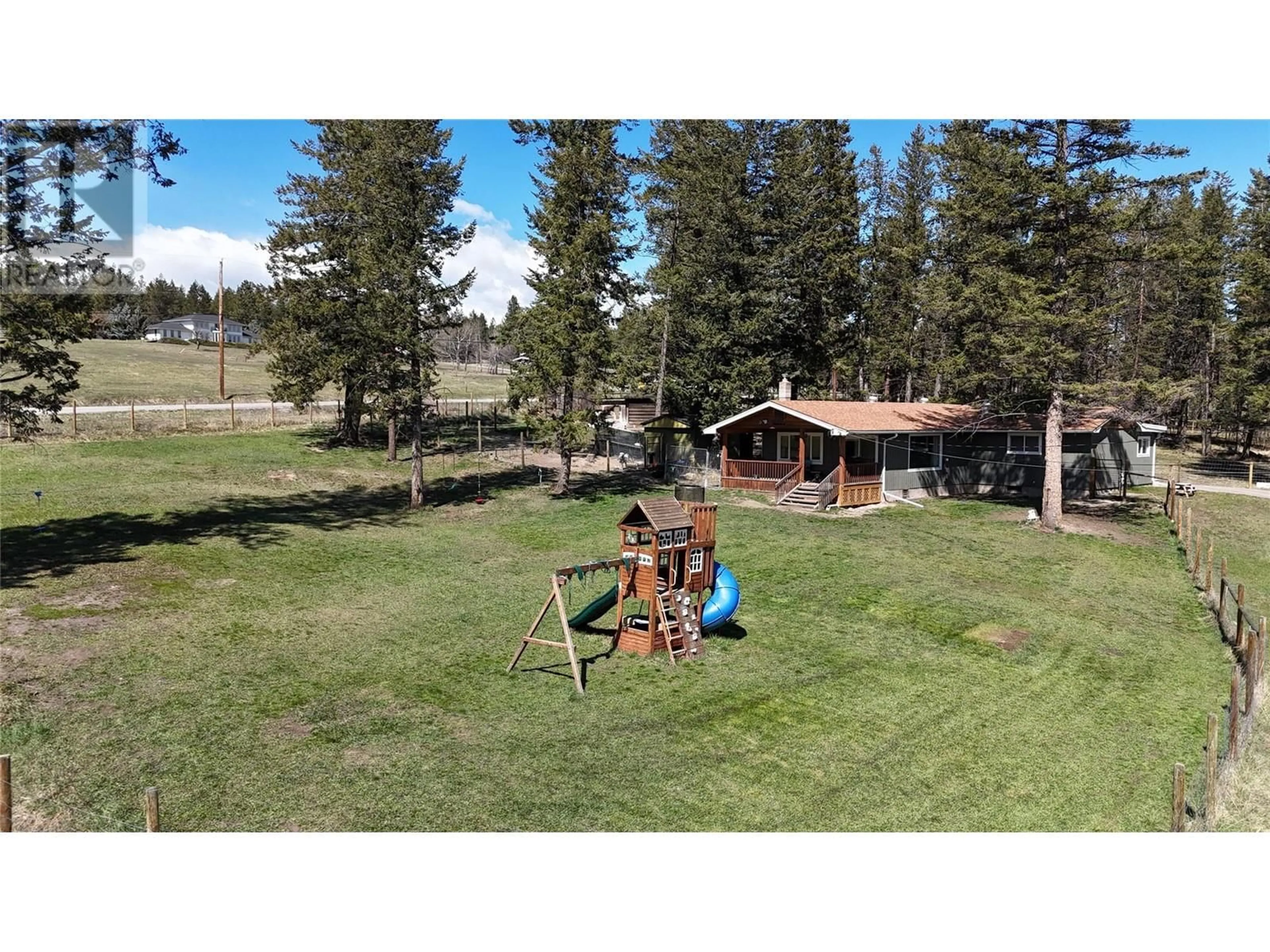 A pic from outside/outdoor area/front of a property/back of a property/a pic from drone, mountain view for 576 BORDEN ROAD, Cranbrook British Columbia V1C6T7