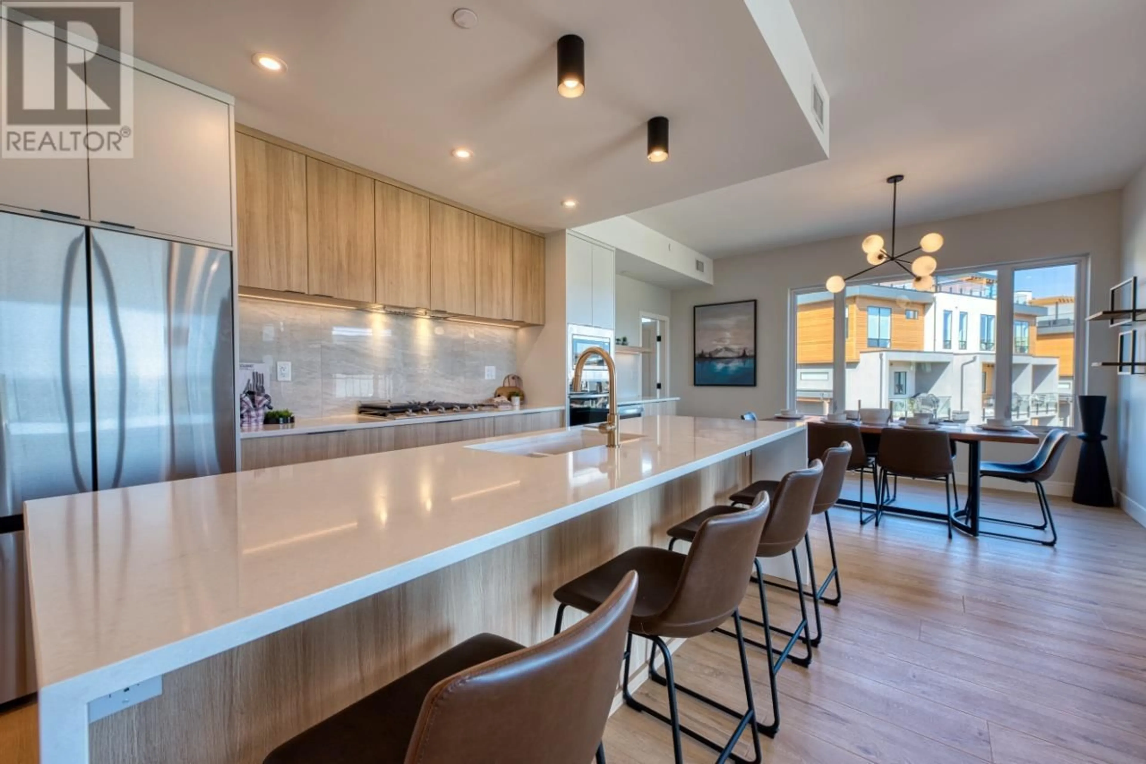 Open concept kitchen, unknown for 103 - 75 PREDATOR RIDGE DRIVE, Vernon British Columbia V1H1G4
