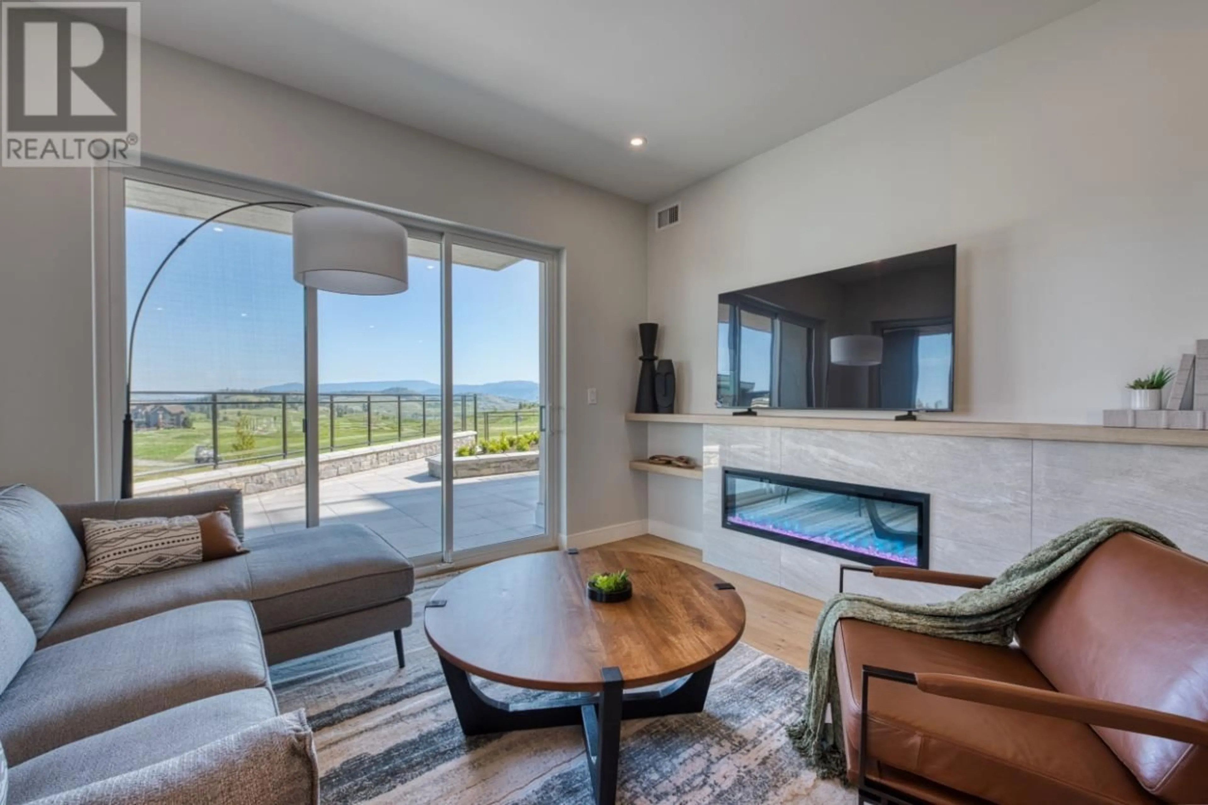 Living room with furniture, unknown for 103 - 75 PREDATOR RIDGE DRIVE, Vernon British Columbia V1H1G4