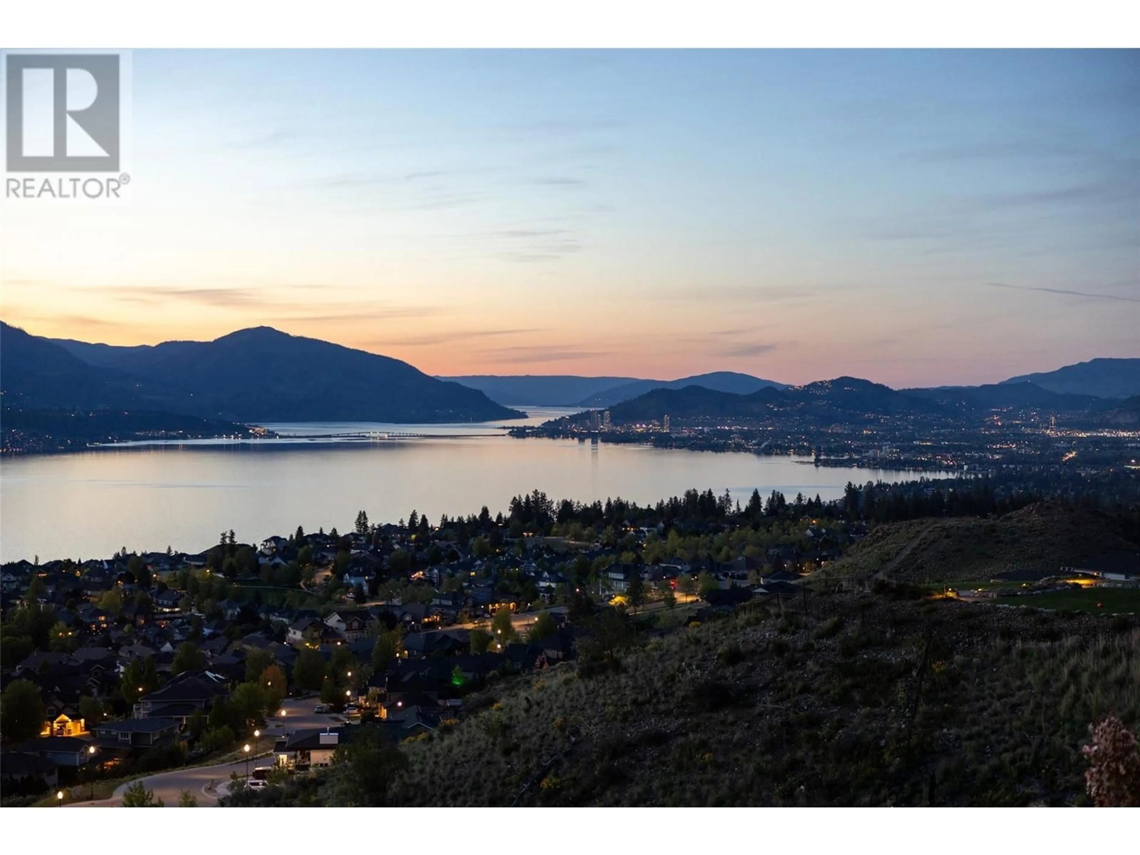 A pic from outside/outdoor area/front of a property/back of a property/a pic from drone, water/lake/river/ocean view for 105 - 5650 THE EDGE PLACE, Kelowna British Columbia V1W5M4