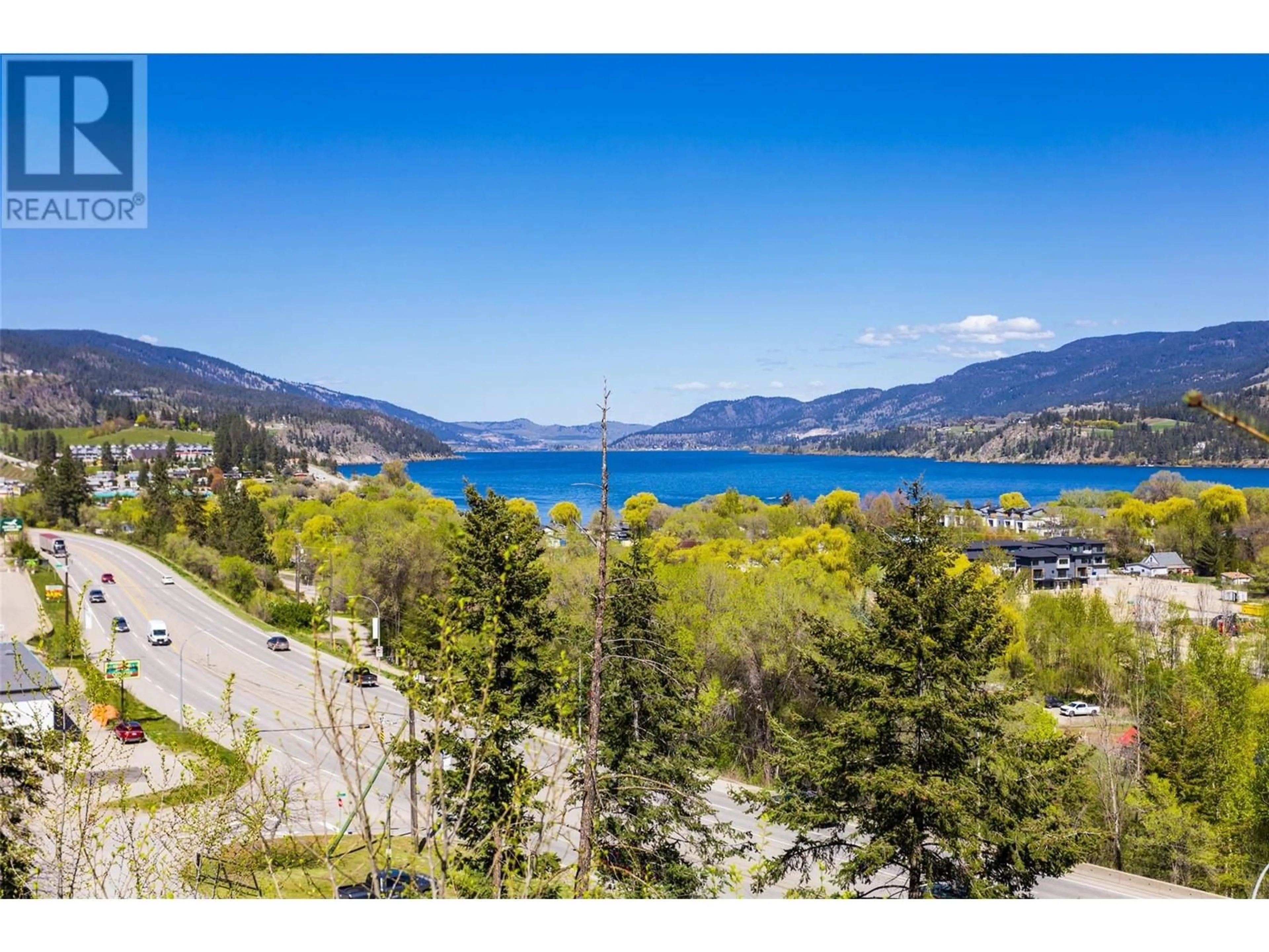 A pic from outside/outdoor area/front of a property/back of a property/a pic from drone, water/lake/river/ocean view for 11231 ROBERTS ROAD, Lake Country British Columbia V4V1L5
