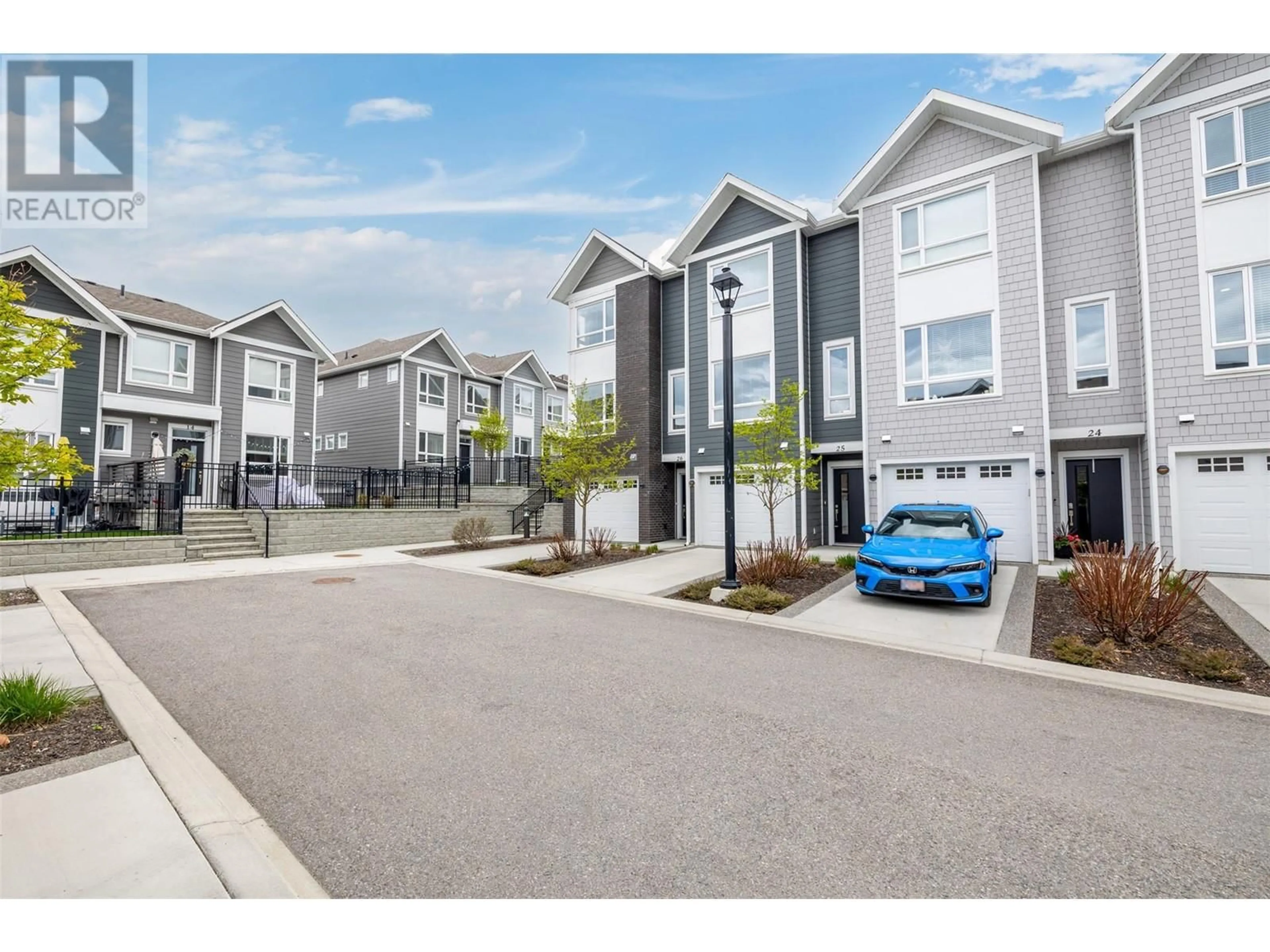 A pic from outside/outdoor area/front of a property/back of a property/a pic from drone, street for 25 - 13098 SHORELINE WAY, Lake Country British Columbia V4V0A8