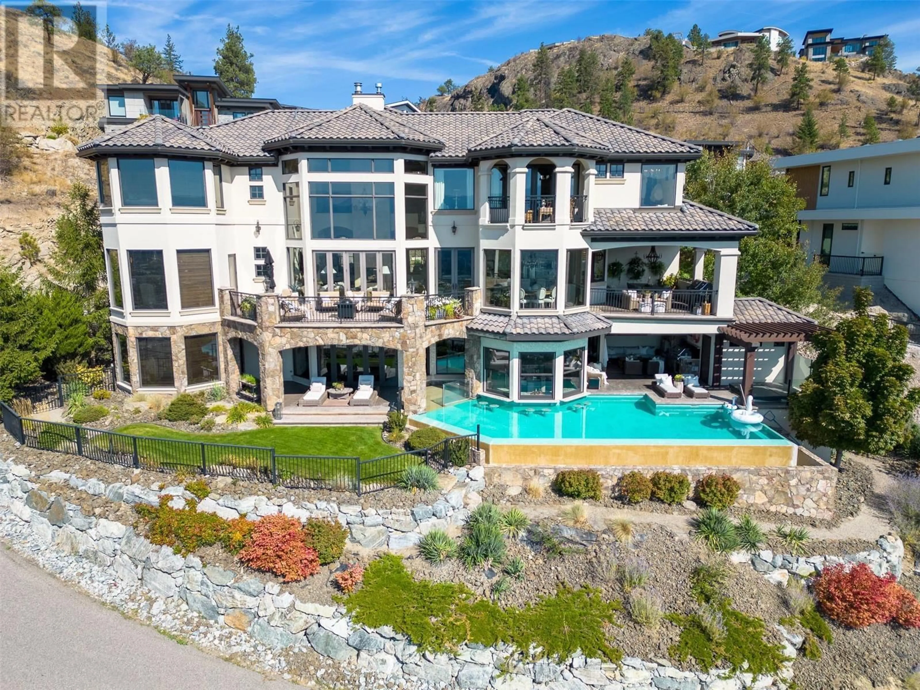 A pic from outside/outdoor area/front of a property/back of a property/a pic from drone, water/lake/river/ocean view for 1113 PARKBLUFF LANE, Kelowna British Columbia V1V2Y3
