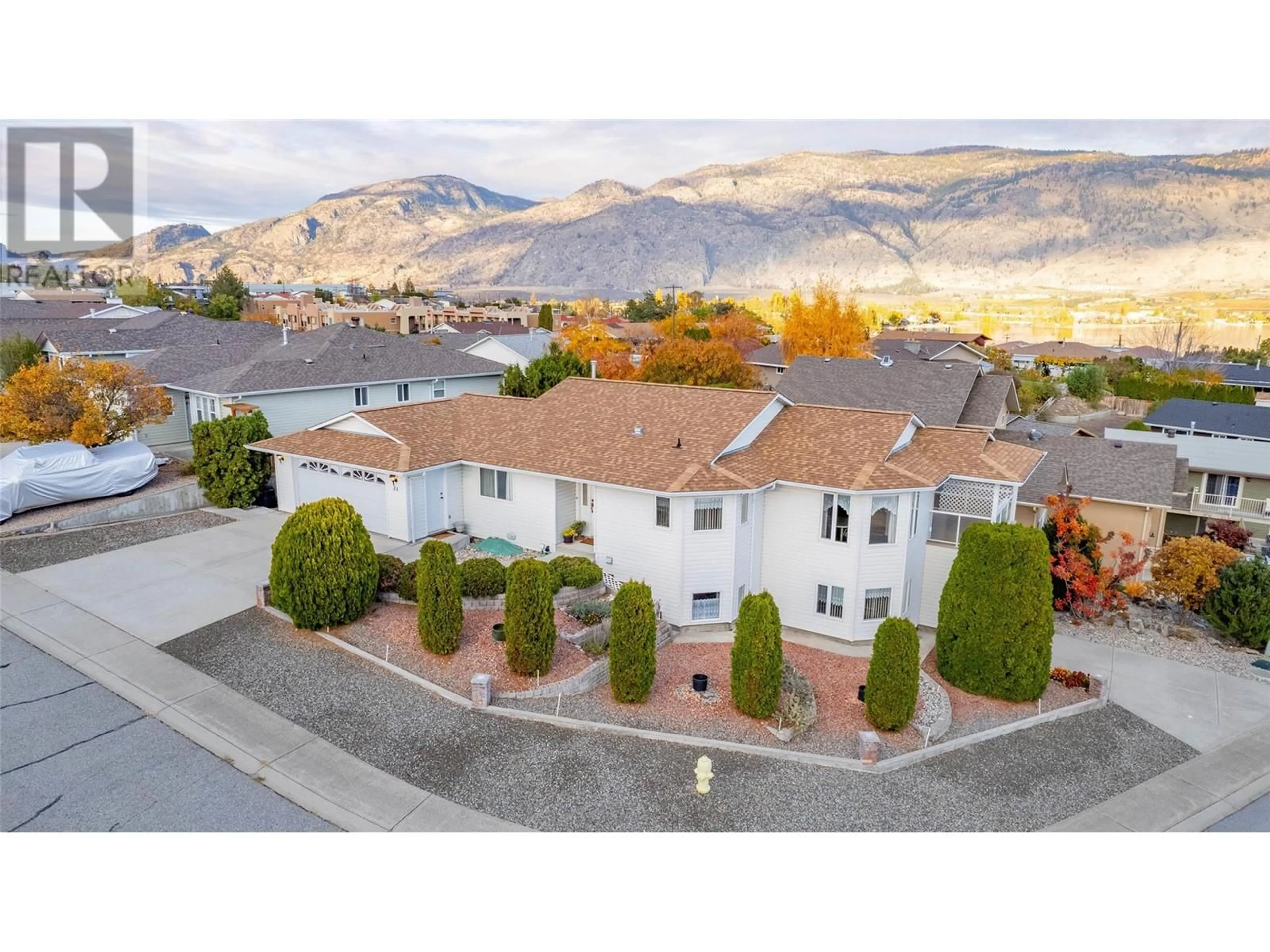 A pic from outside/outdoor area/front of a property/back of a property/a pic from drone, mountain view for 51 CACTUS CRESCENT, Osoyoos British Columbia V0H1V1