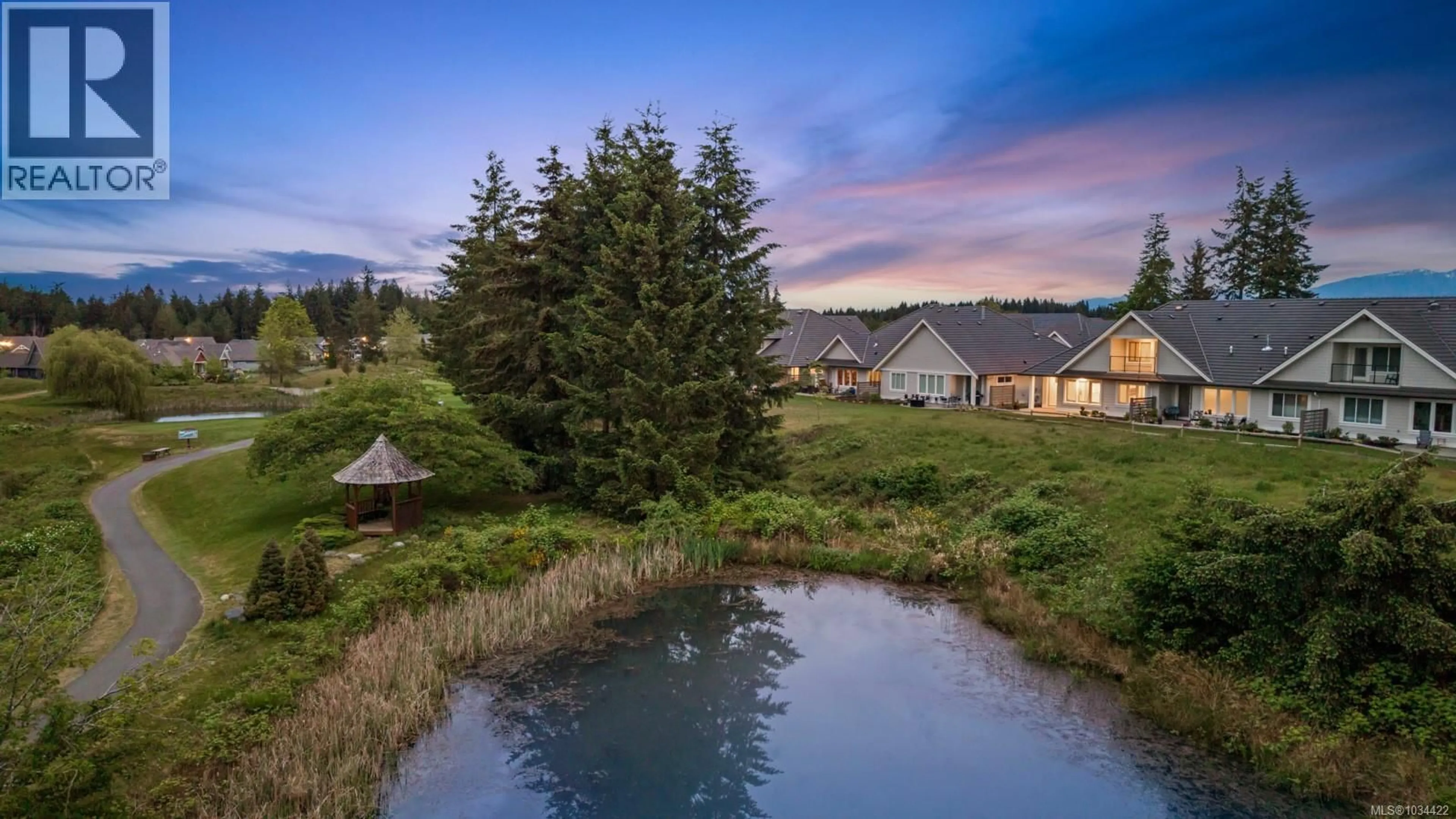 A pic from outside/outdoor area/front of a property/back of a property/a pic from drone, water/lake/river/ocean view for 130 - 1444 CROWN ISLE DRIVE, Courtenay British Columbia V9N0B8