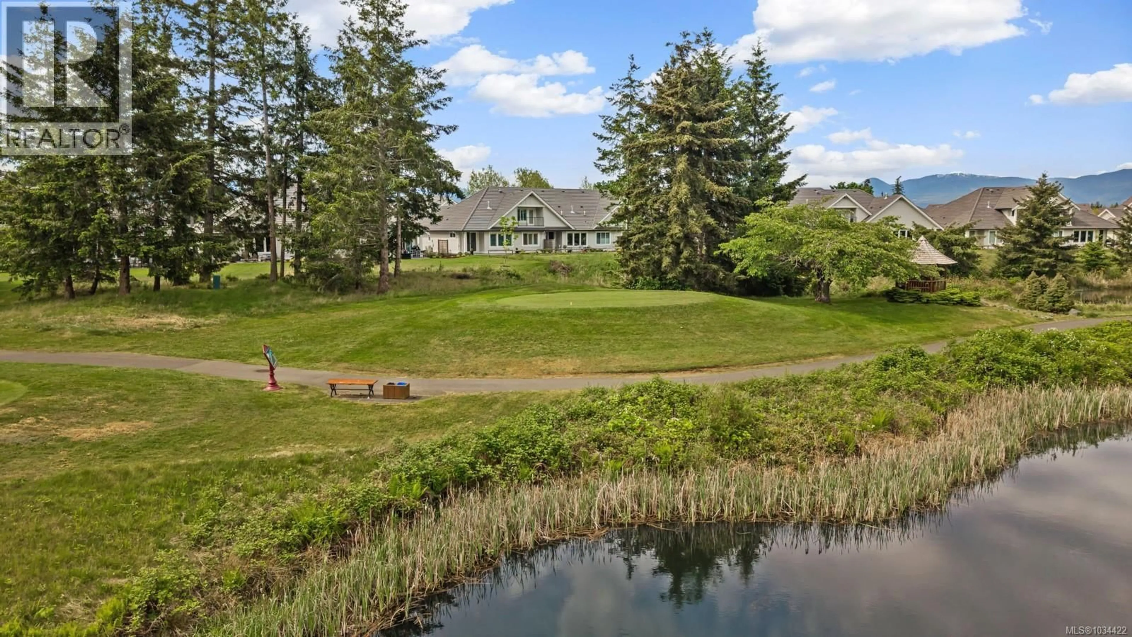 A pic from outside/outdoor area/front of a property/back of a property/a pic from drone, water/lake/river/ocean view for 130 - 1444 CROWN ISLE DRIVE, Courtenay British Columbia V9N0B8