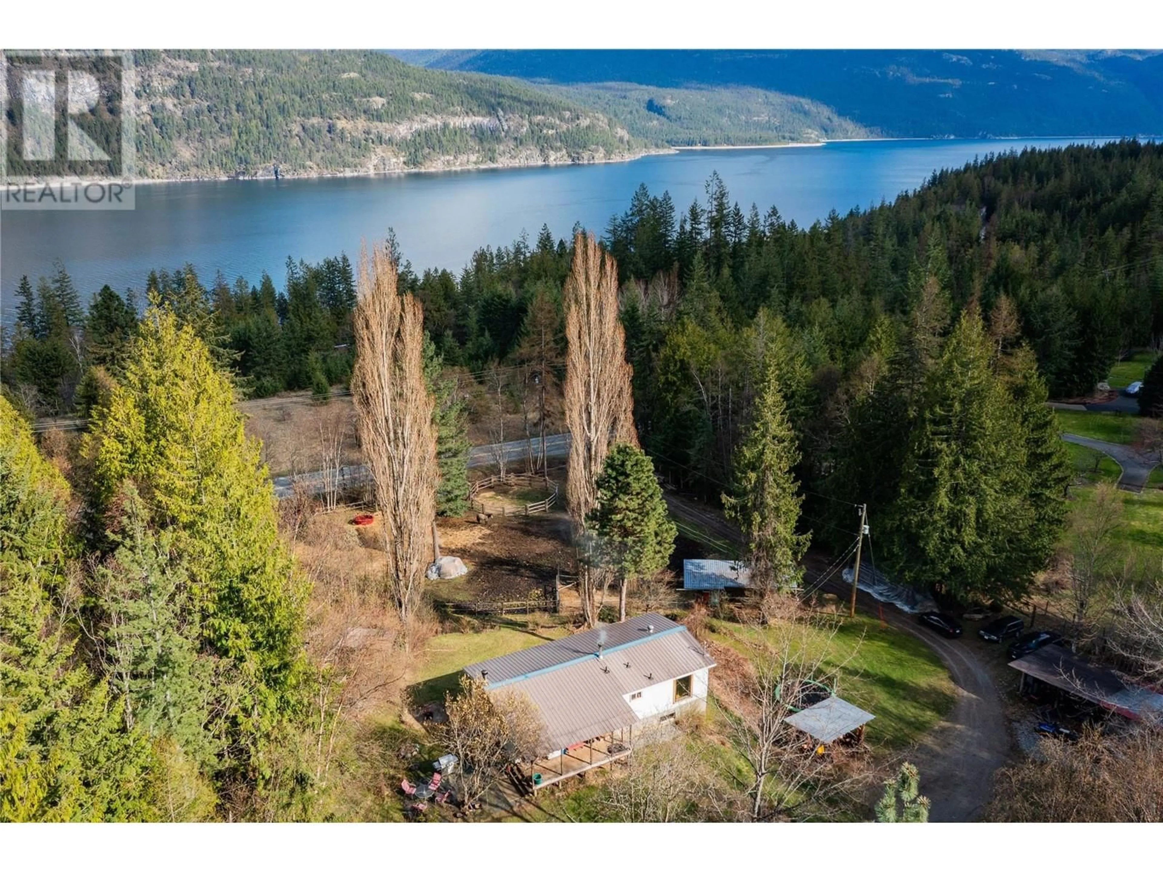 A pic from outside/outdoor area/front of a property/back of a property/a pic from drone, water/lake/river/ocean view for 9351 31 HIGHWAY, Kaslo British Columbia V0G1M0