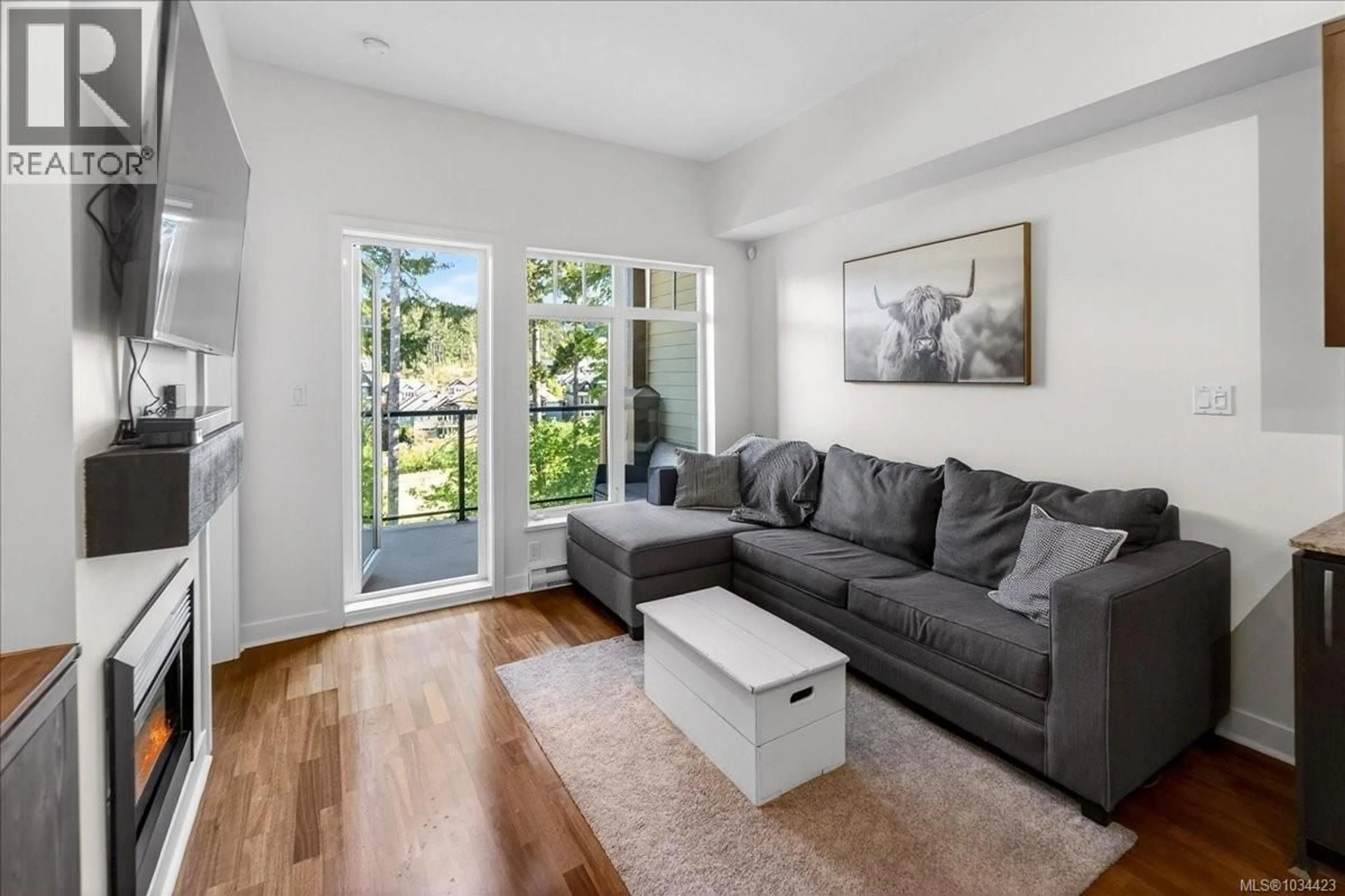 Living room with furniture, unknown for 404 - 1395 BEAR MOUNTAIN PARKWAY, Langford British Columbia V9B0E1