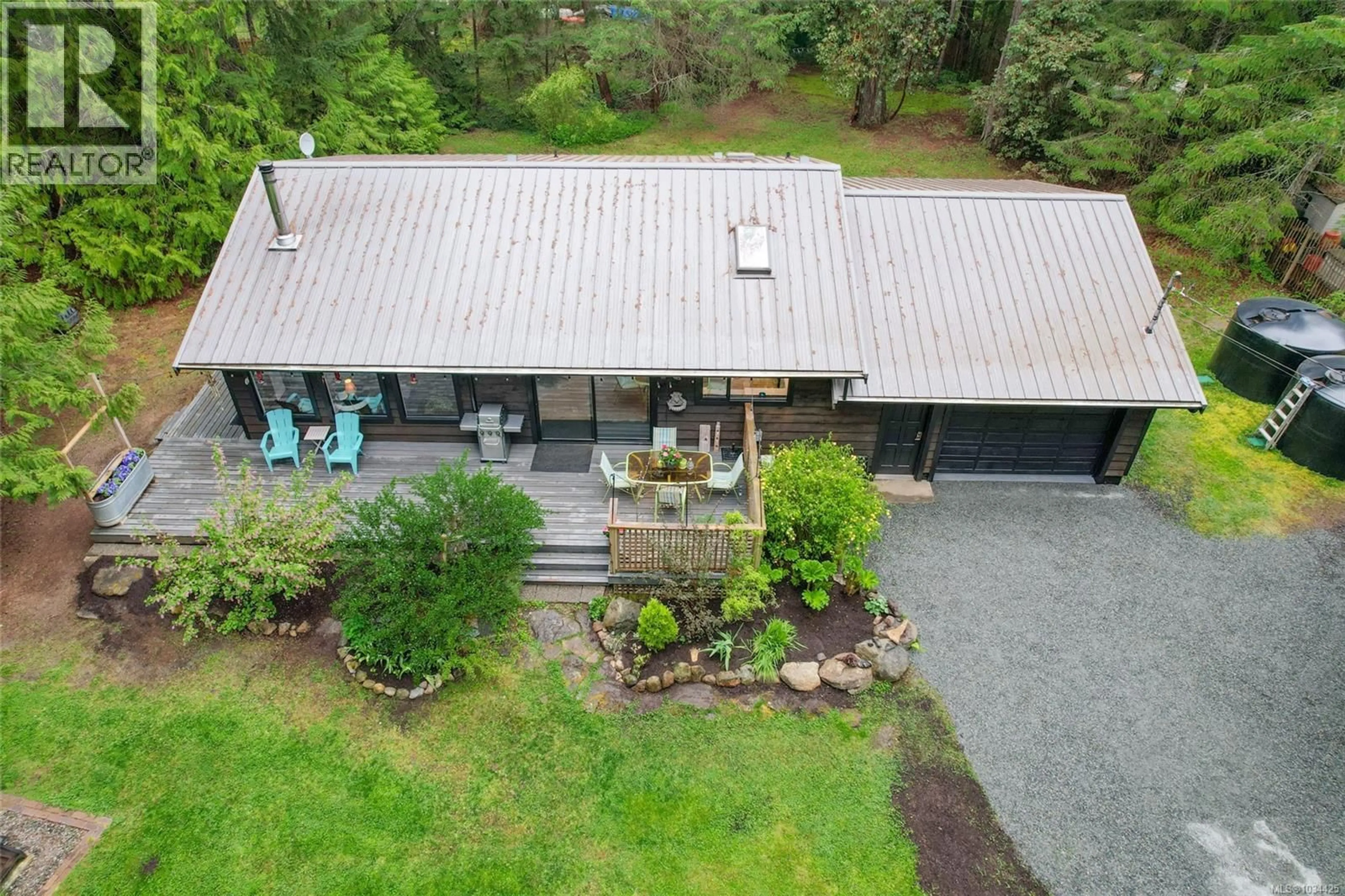 A pic from outside/outdoor area/front of a property/back of a property/a pic from drone, unknown for 438 DUNSHIRE DRIVE, Gabriola Island British Columbia V0R1X2