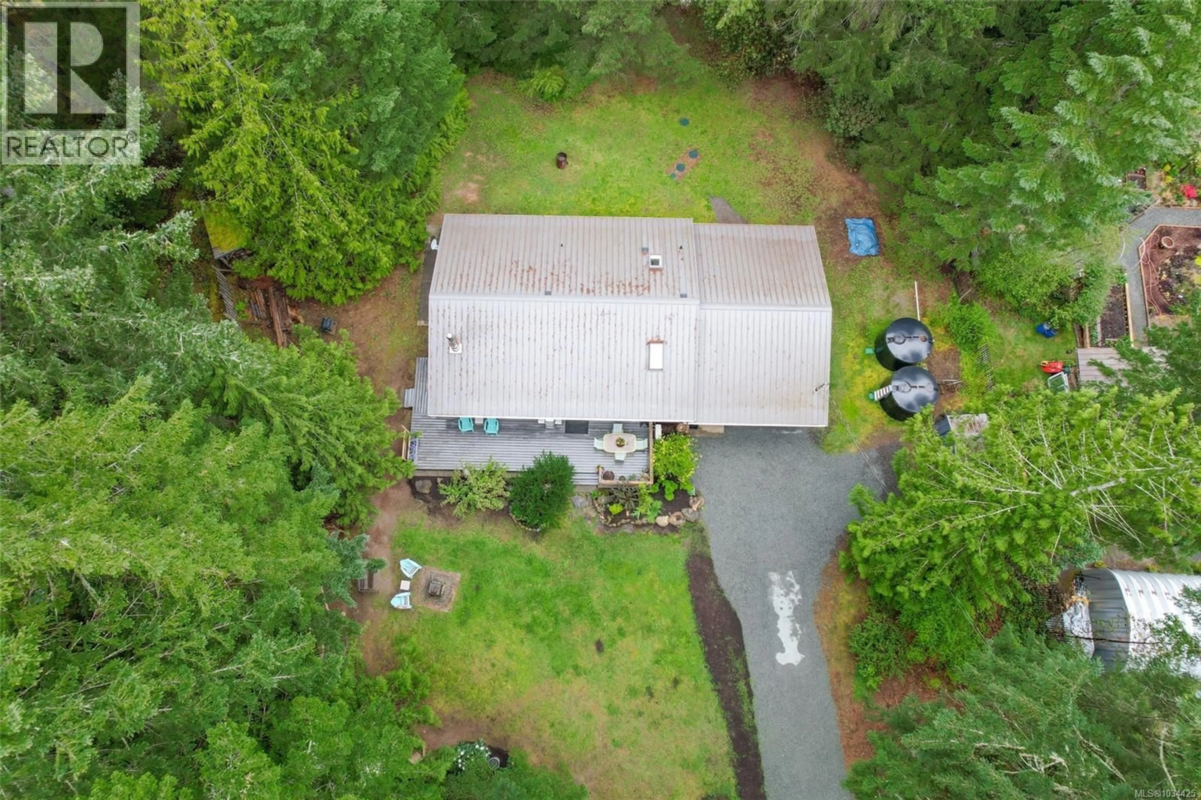 A pic from outside/outdoor area/front of a property/back of a property/a pic from drone, unknown for 438 DUNSHIRE DRIVE, Gabriola Island British Columbia V0R1X2