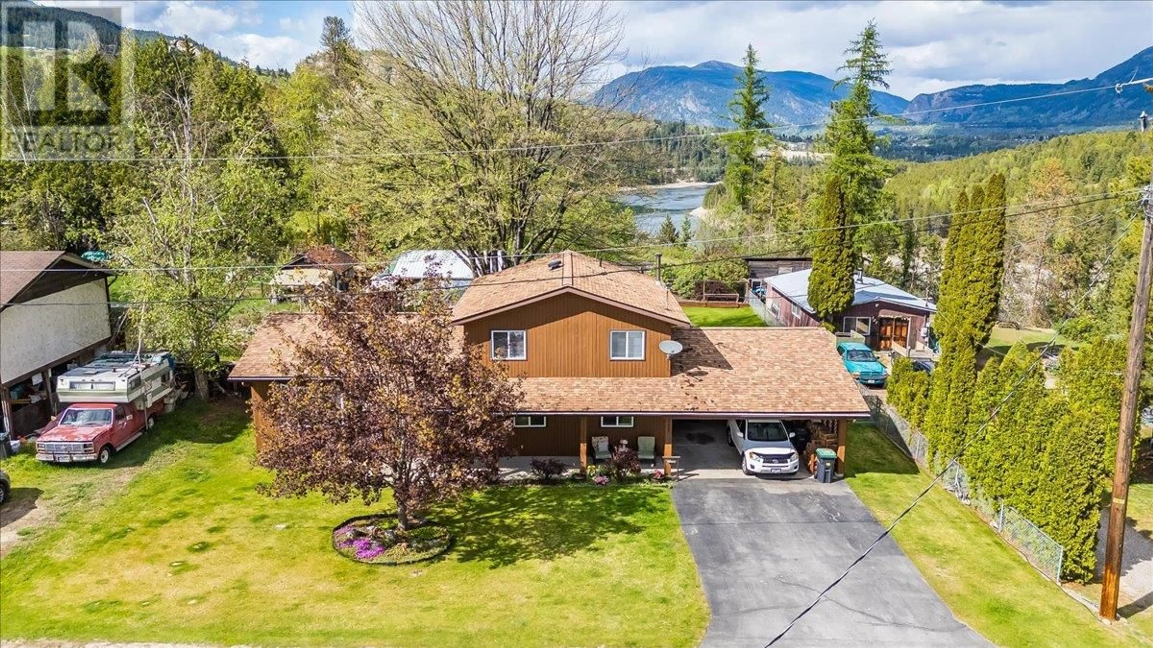 A pic from outside/outdoor area/front of a property/back of a property/a pic from drone, mountain view for 523 105TH STREET, Castlegar British Columbia V1N3G7