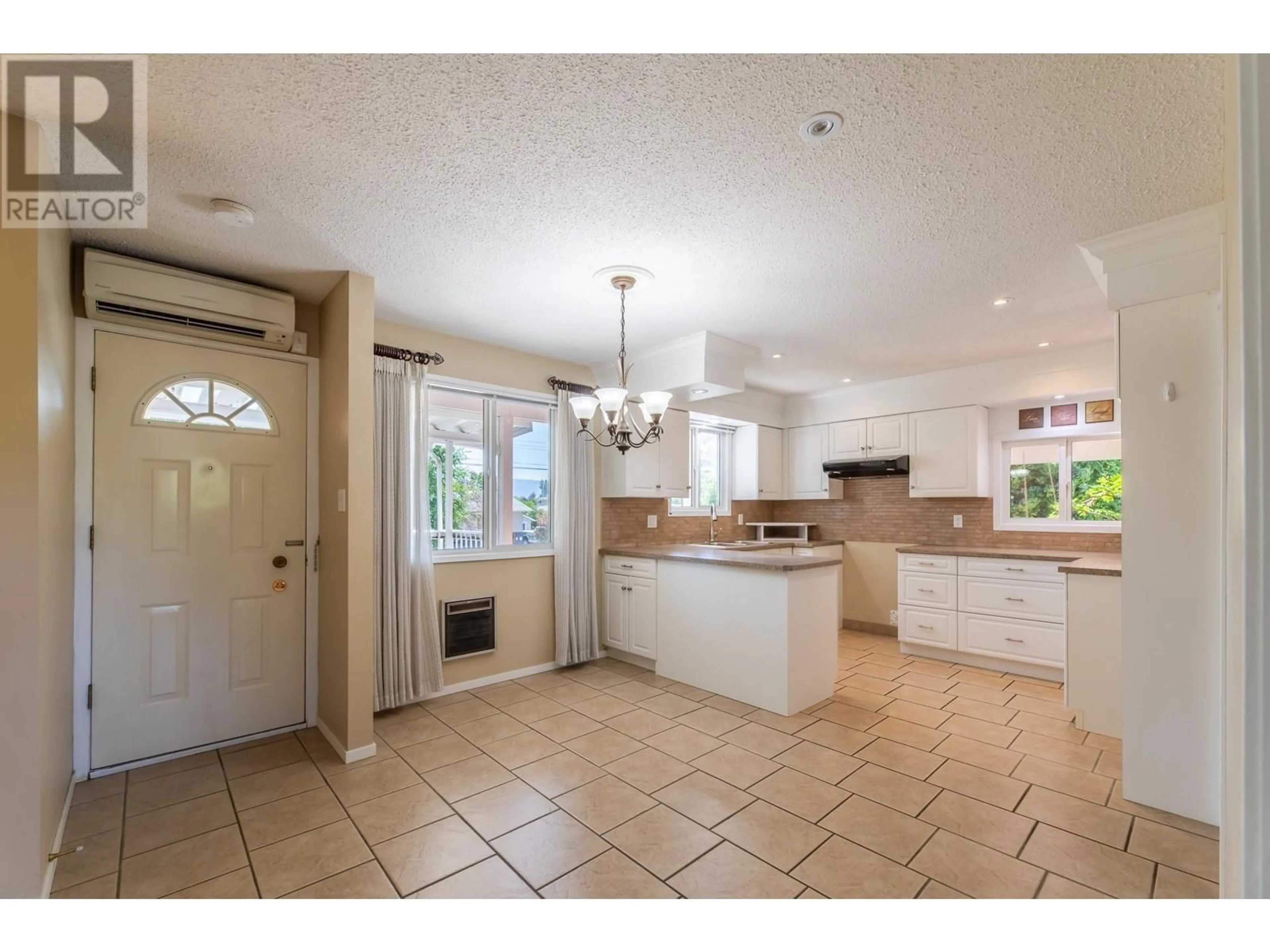 Open concept kitchen, ceramic/tile floor for 13018 ARMSTRONG AVENUE, Summerland British Columbia V0H1Z0