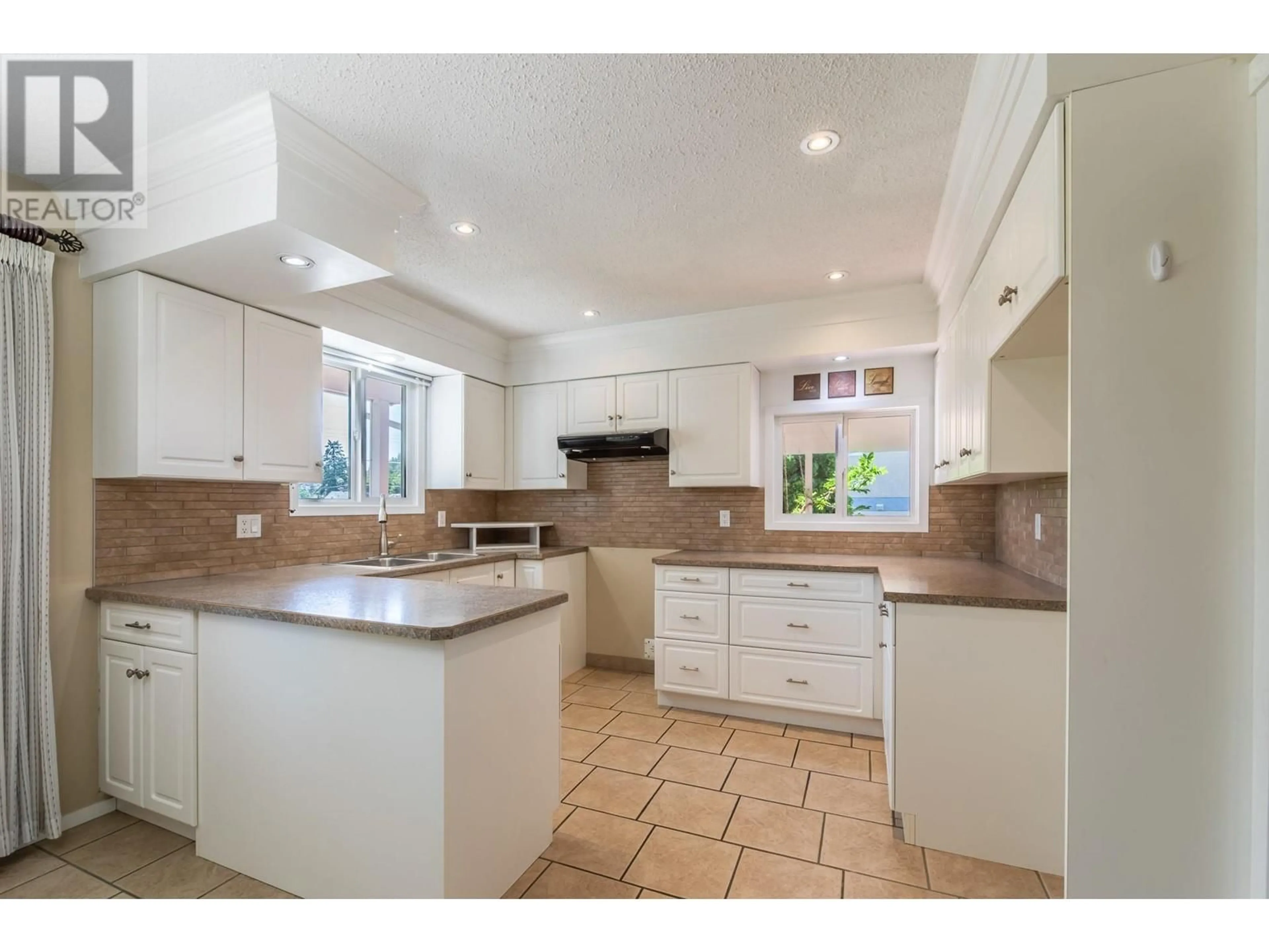 Open concept kitchen, ceramic/tile floor for 13018 ARMSTRONG AVENUE, Summerland British Columbia V0H1Z0