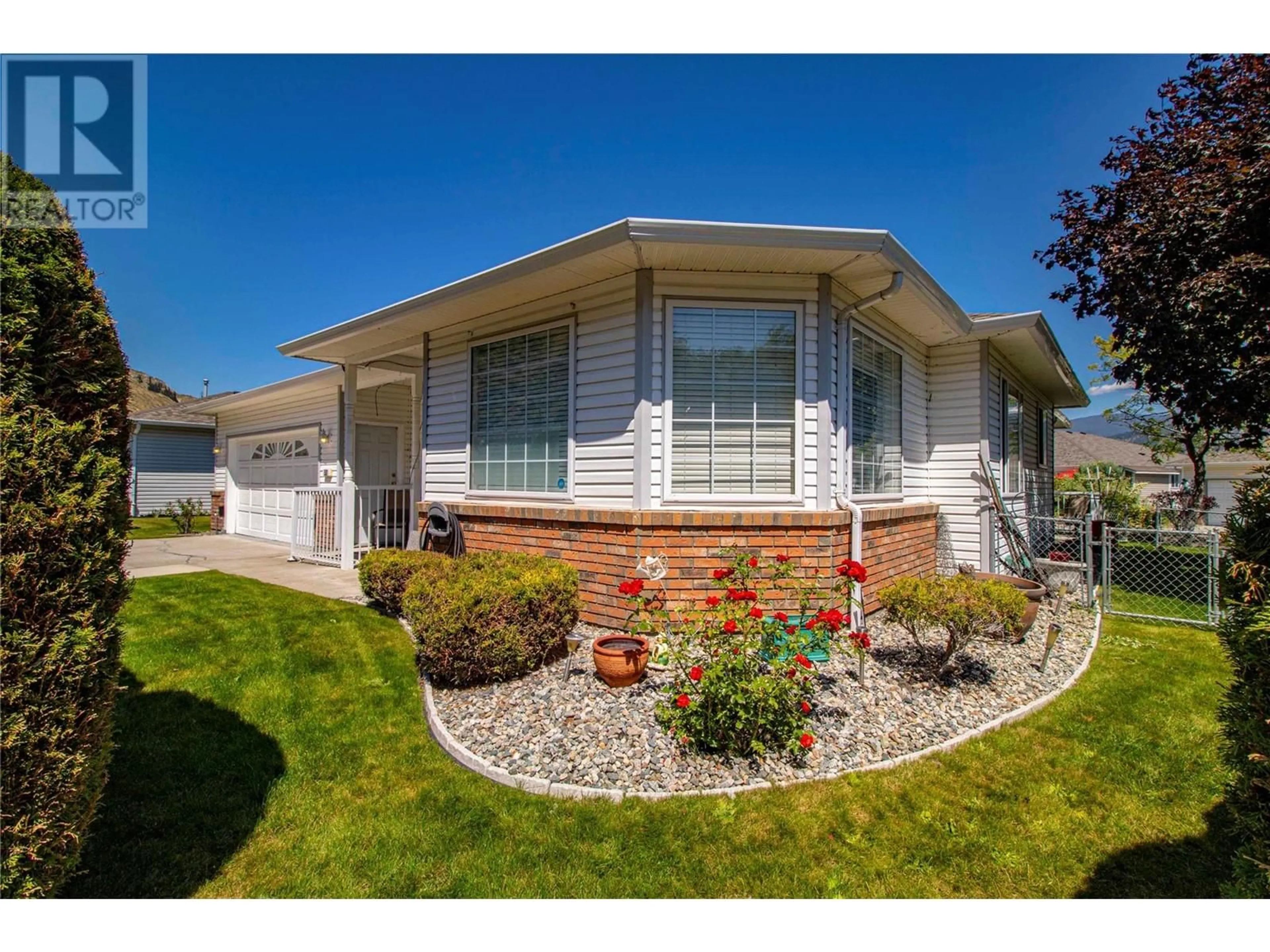 Home with vinyl exterior material, street for 501 RED WING DRIVE, Penticton British Columbia V2A8N7