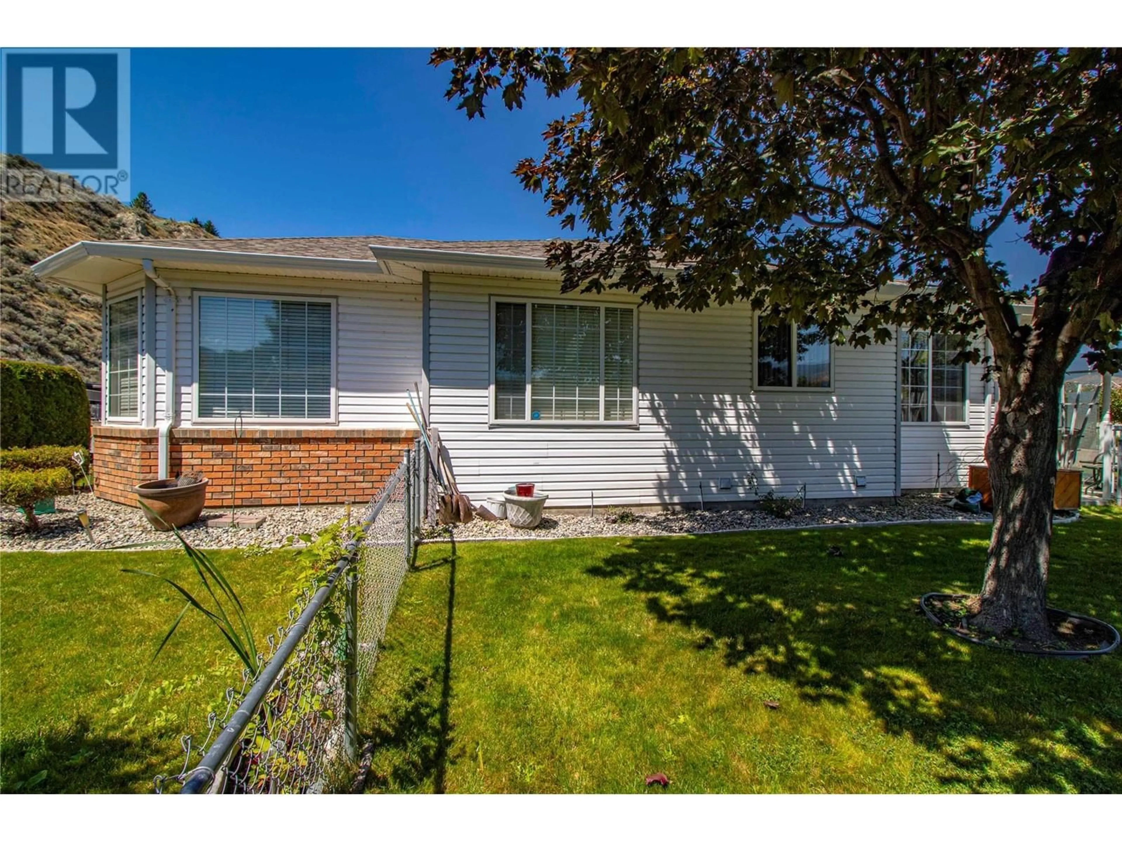 Home with vinyl exterior material, street for 501 RED WING DRIVE, Penticton British Columbia V2A8N7