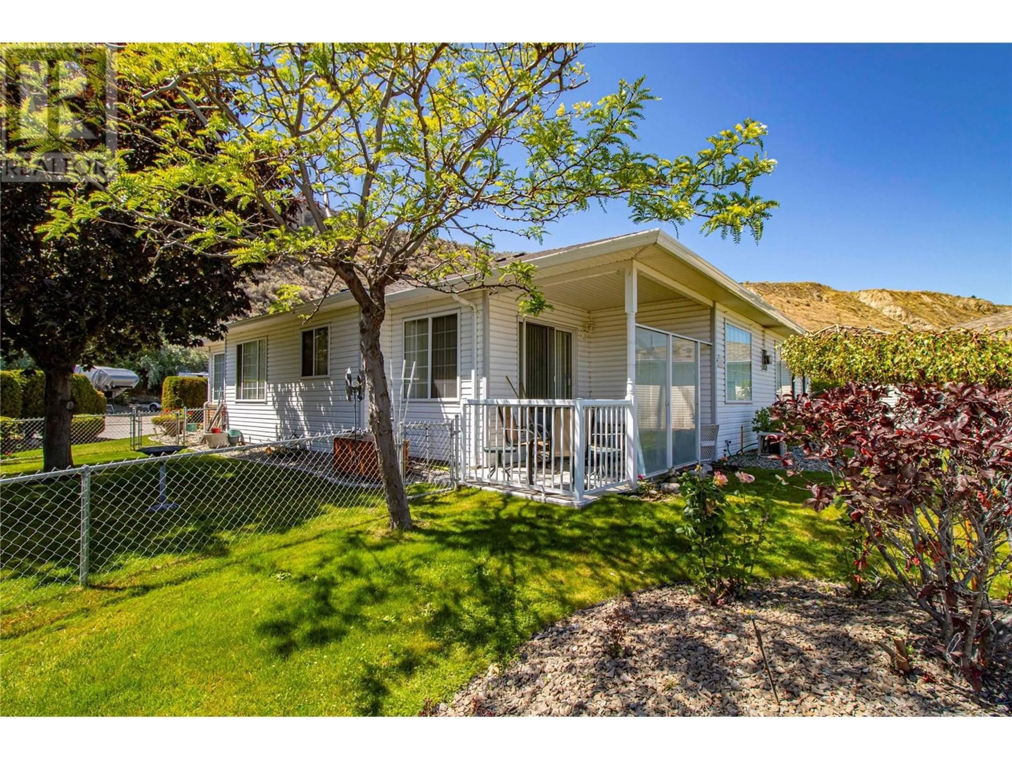 A pic from outside/outdoor area/front of a property/back of a property/a pic from drone, street for 501 RED WING DRIVE, Penticton British Columbia V2A8N7